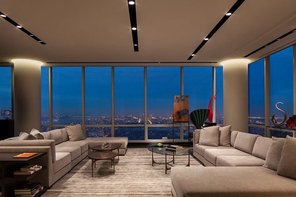 Penthouse living room on Central Park South, Billionaire’s Row, New York, showcasing lighting design by Tirschwell Lighting.