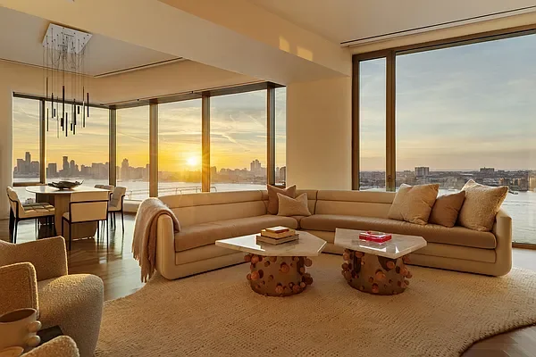 Sunset in the Living room of West Chelsea penthouse, New York, featuring lighting design by Tirschwell Lighting, designed by Tadao Ando.