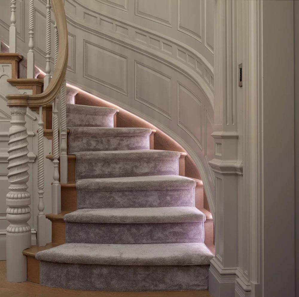 Stairwell with integrated lighting design by Tirschwell Lighting in Central Park West residence, New York, designed by William Leeds.