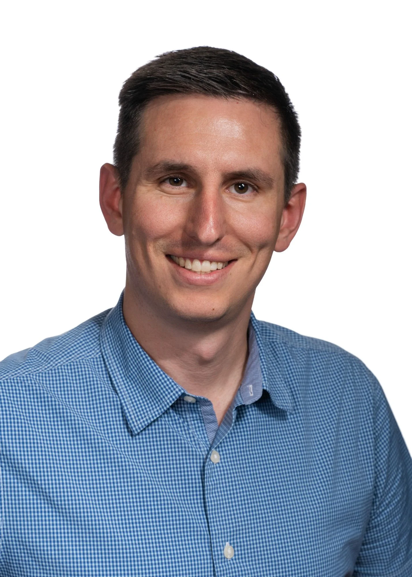 Dr. Kaleb Roberts, board-certified family physician and founder of Bandera Direct Primary Care, smiling in a professional headshot.