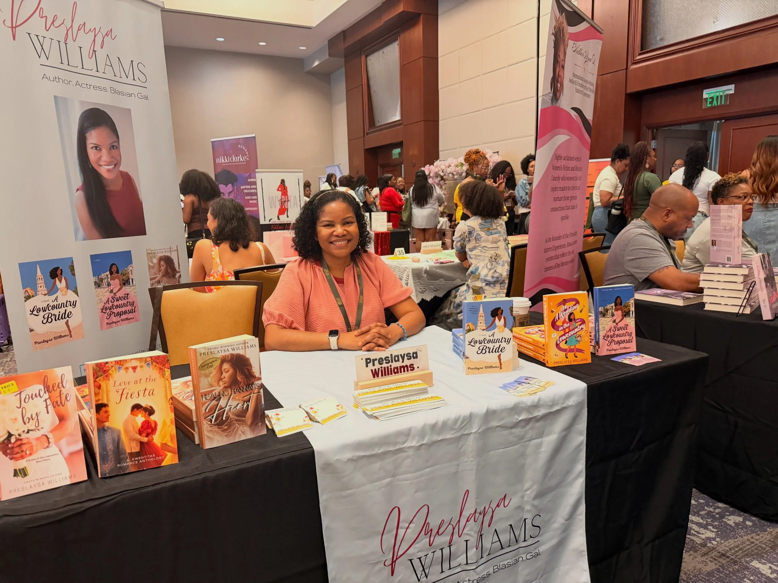 I am at the @blackromancebookfestival I am enjoying connecting with readers and fellow authors!