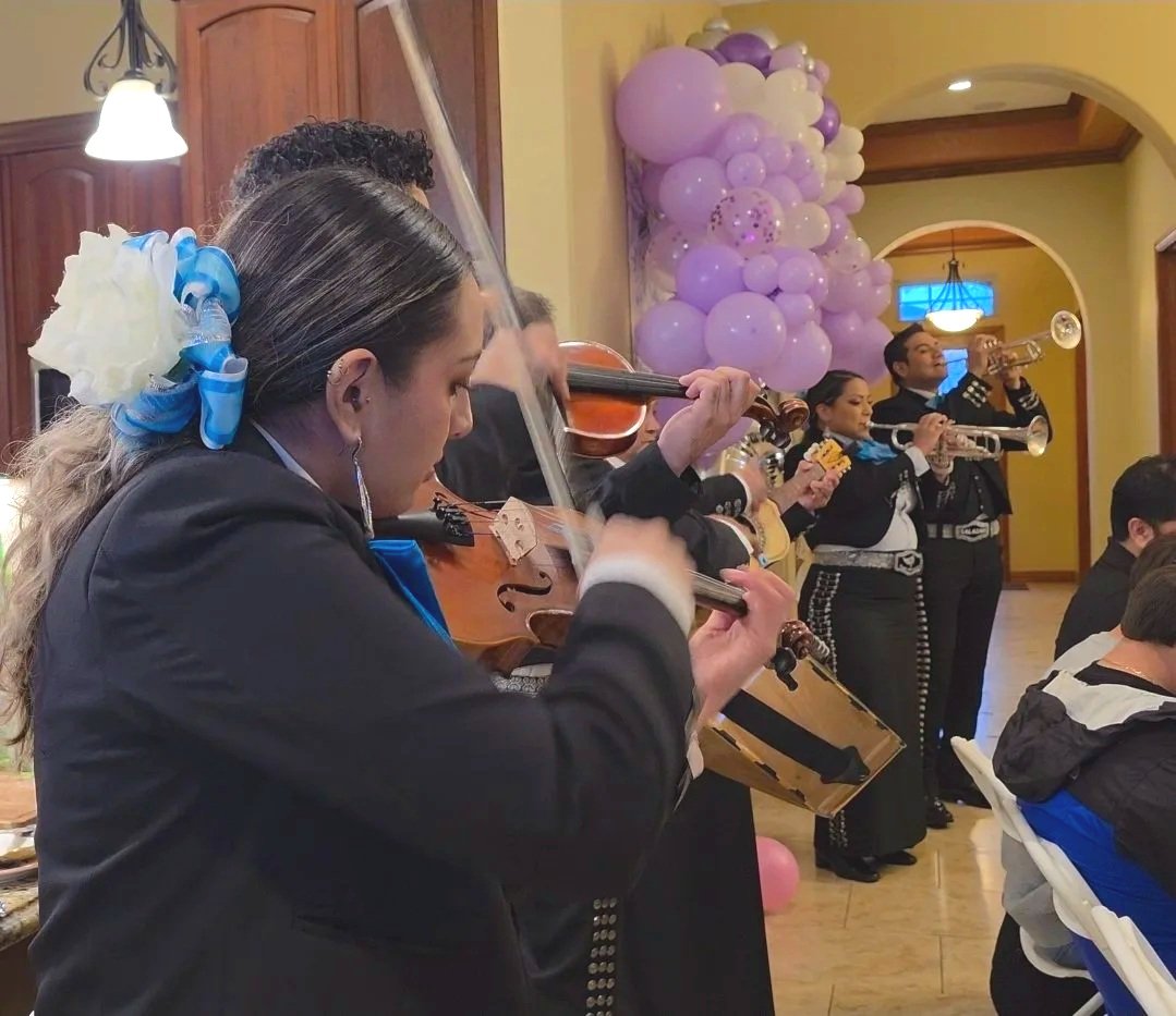 Mariachi Armonia 6- piece mariachi group performing at a birthday party