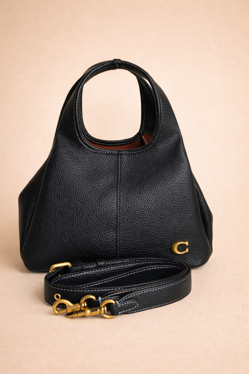 Elegant Black Sculpted Top Handle Satchel