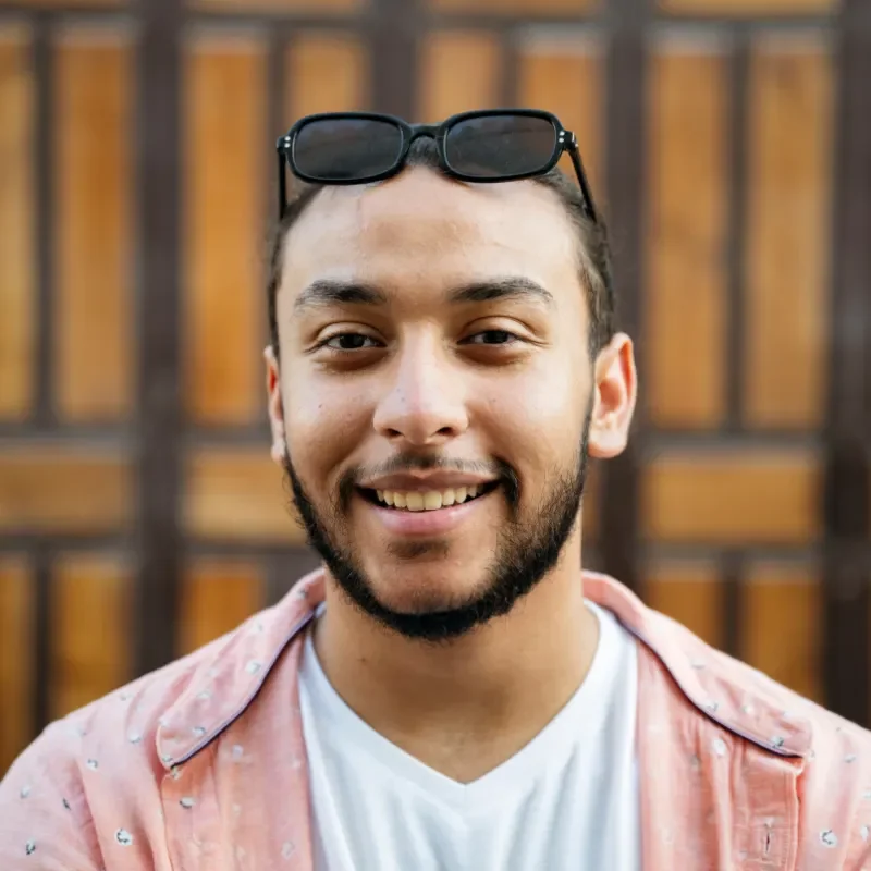 a young man smiling