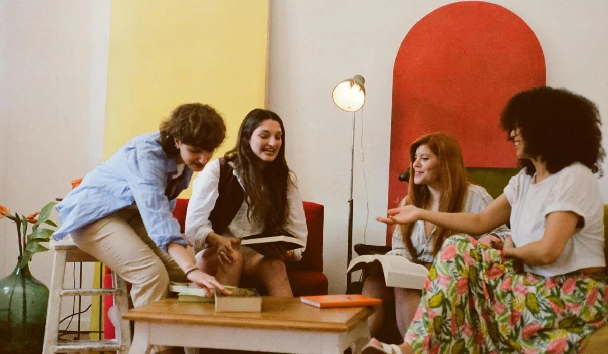 a group of friends in a beautifully decorated indoor space