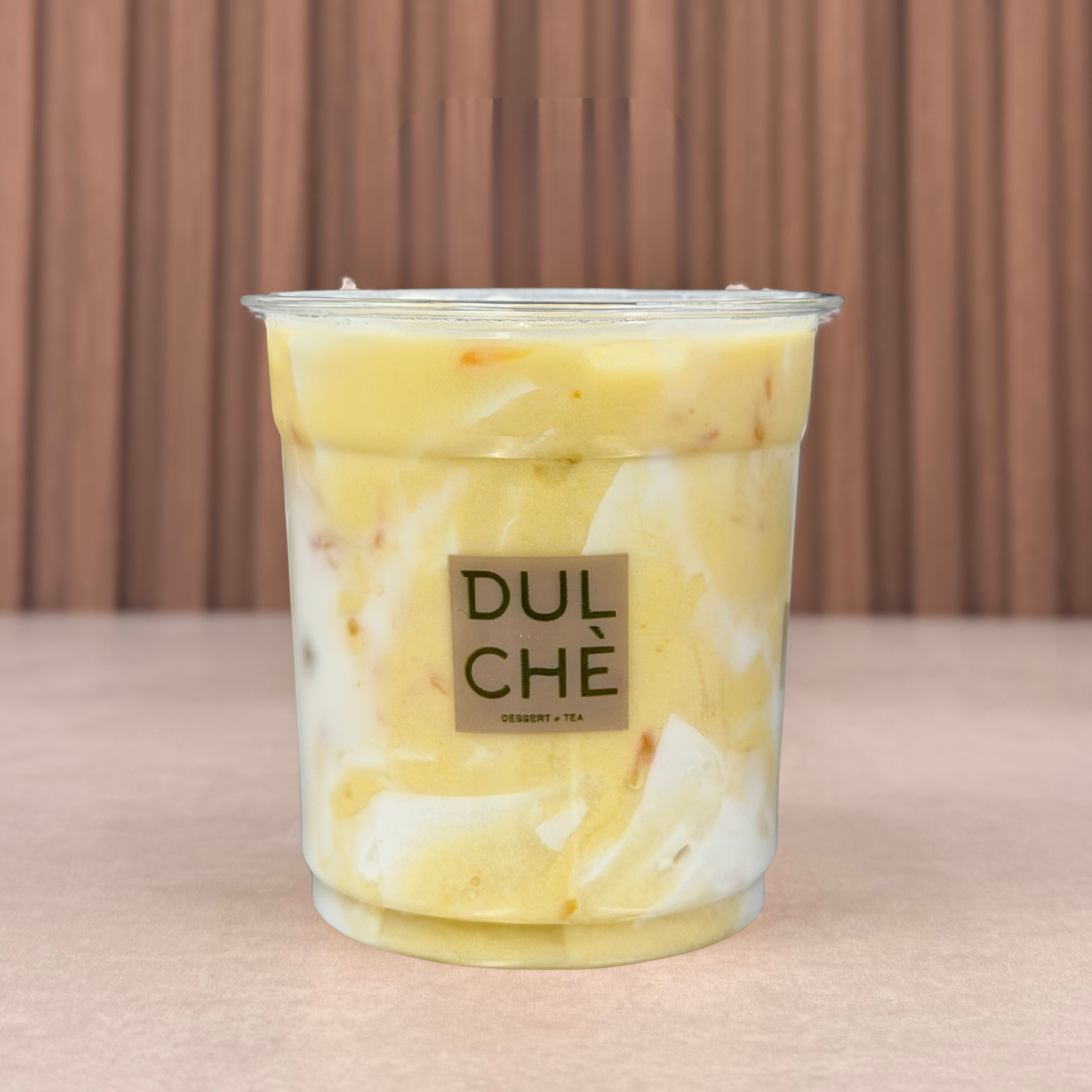 Mango Pomelo - Chè Xoài Bưổi. 
Bright, juicy, and refreshing. Creamy mango milk with little bursts of citrus and tropical fruit throughout.