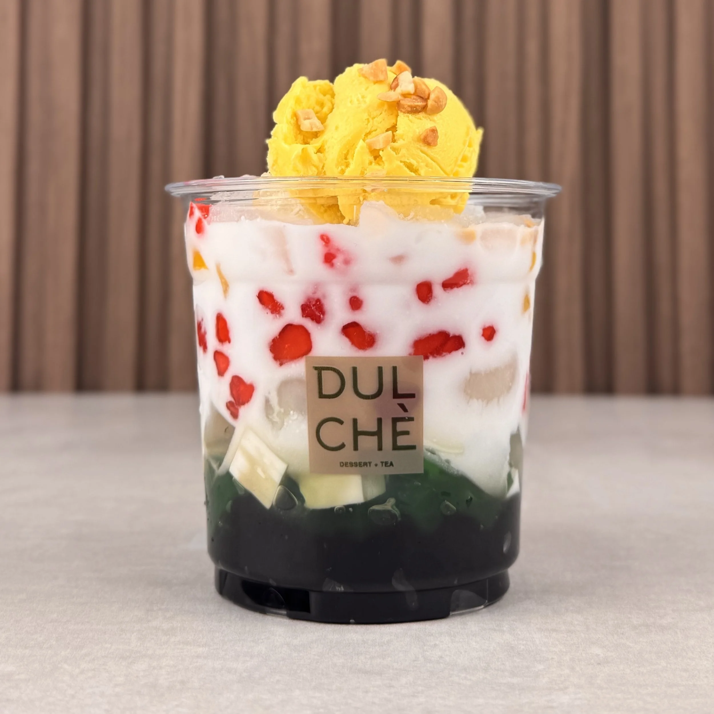 House Special - Chè Đặc Biệt. 
A little bit of everything in the best way possible. Every bite is creamy, chewy, crunchy, cold, and sweet all at once. Contains peanuts & durian ice cream.