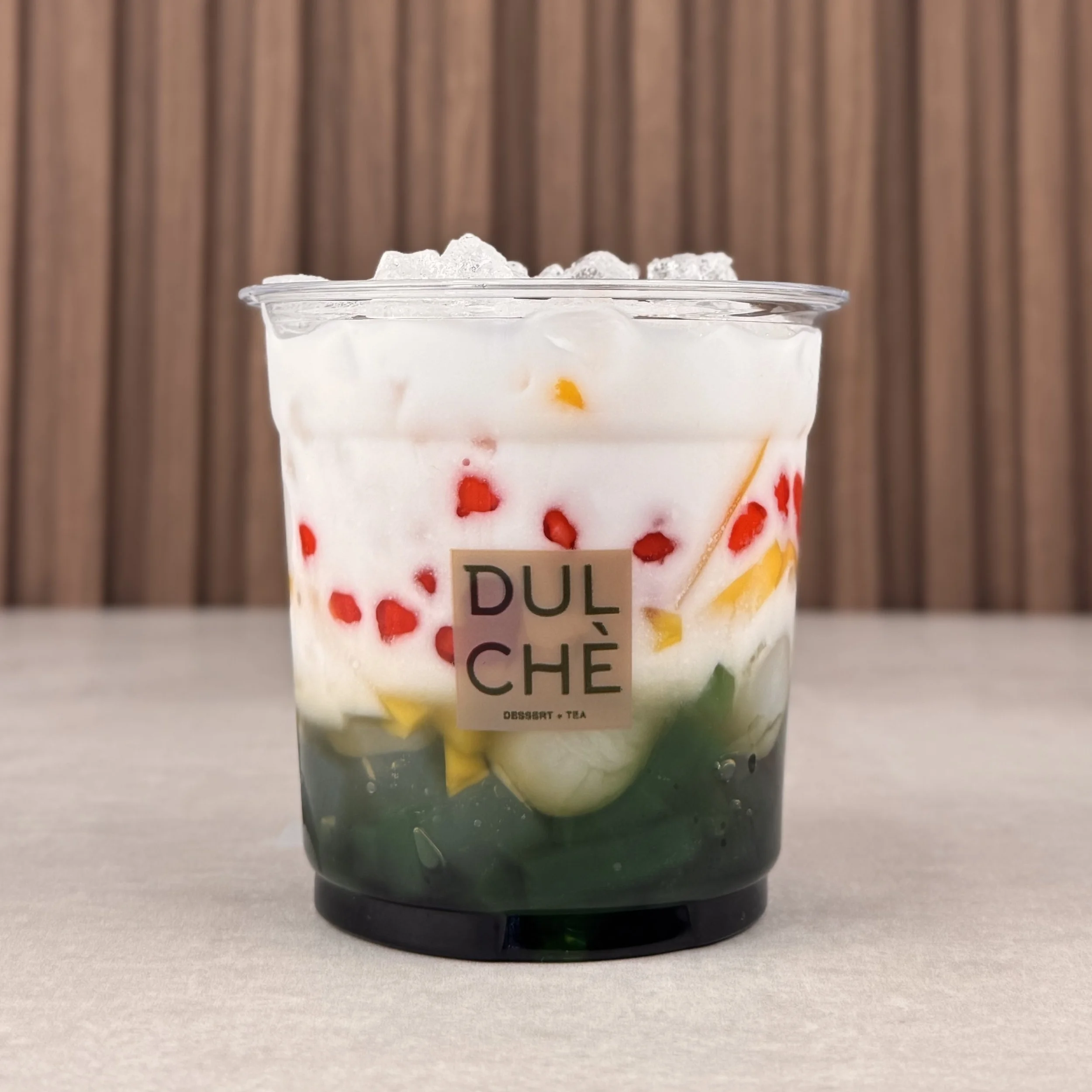 Thai - Chè Thái. 
A fruity tropical mix layered in creamy house milk. Sweet, floral, refreshing, and full of texture.