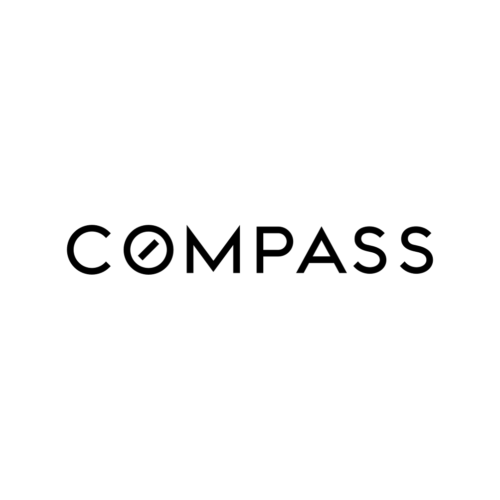 The word "COMPASS" in black text with the letter "O" replaced by a compass icon on a white background.