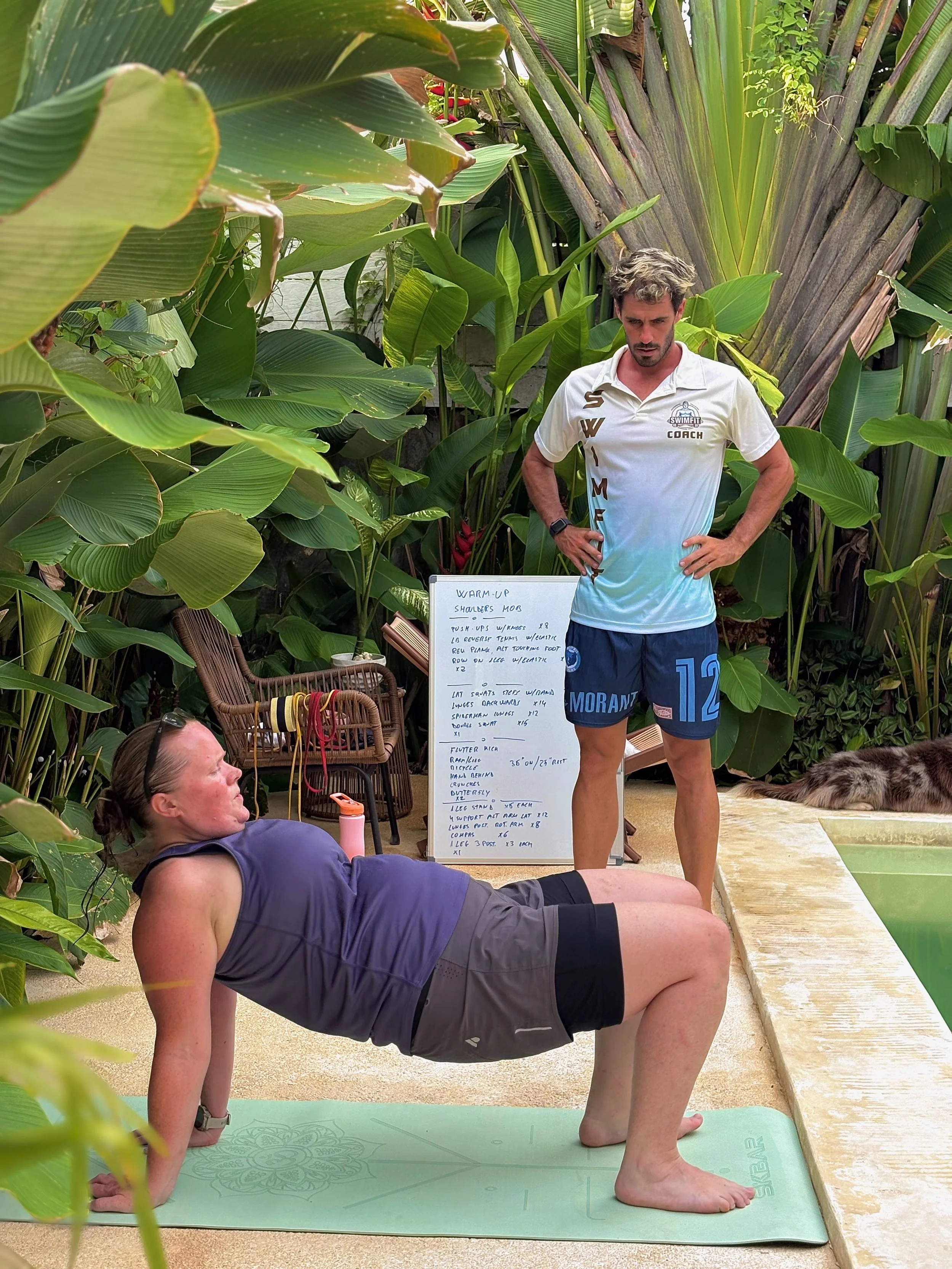 David coaching his guest through a fitness routine on one of his private swimfit retreats