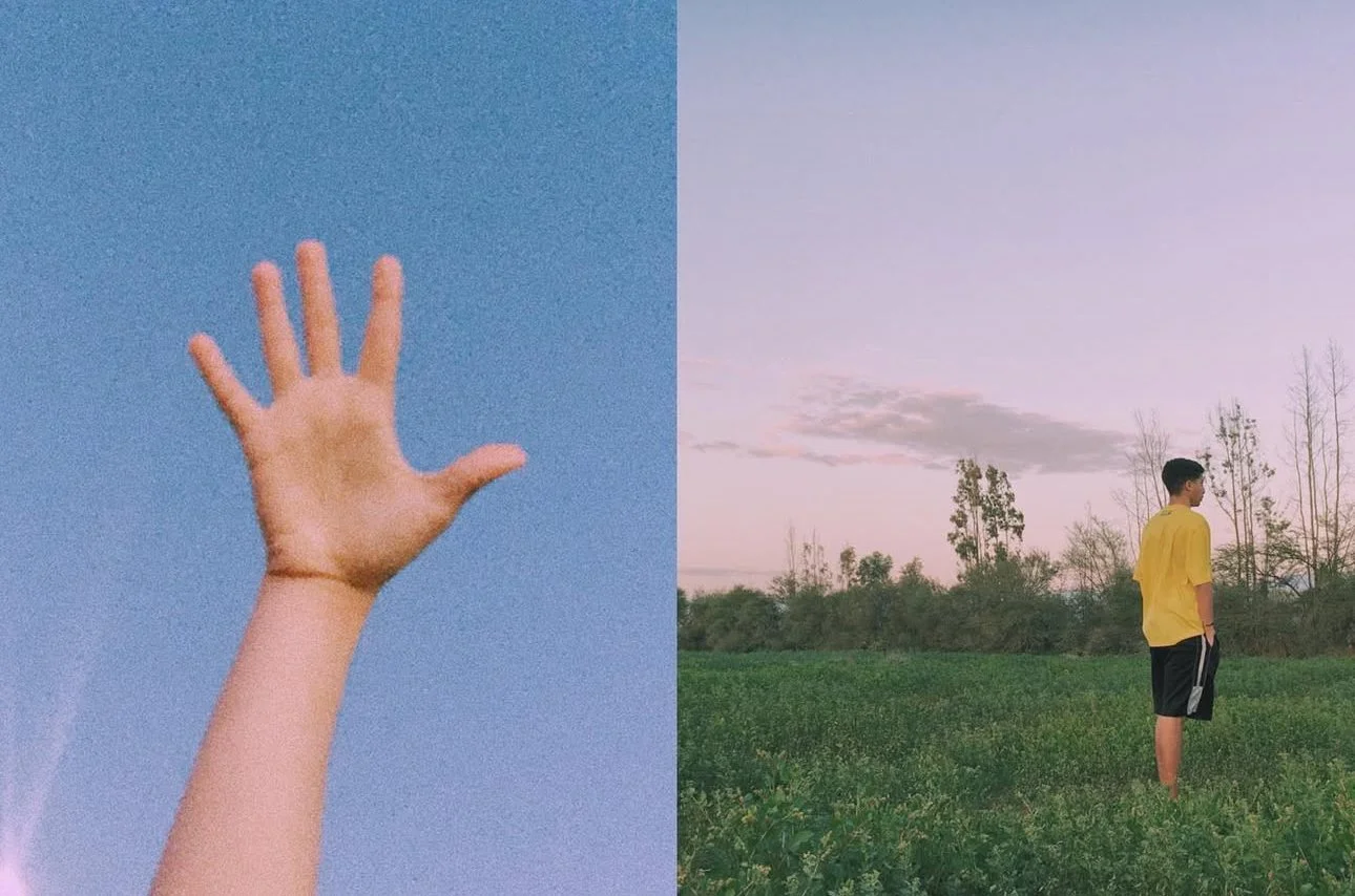 A split image showing a person's hand reaching up against a blue sky on the left, and a boy in a yellow shirt and black shorts standing in a grassy field with trees and a pinkish sky in the background on the right.