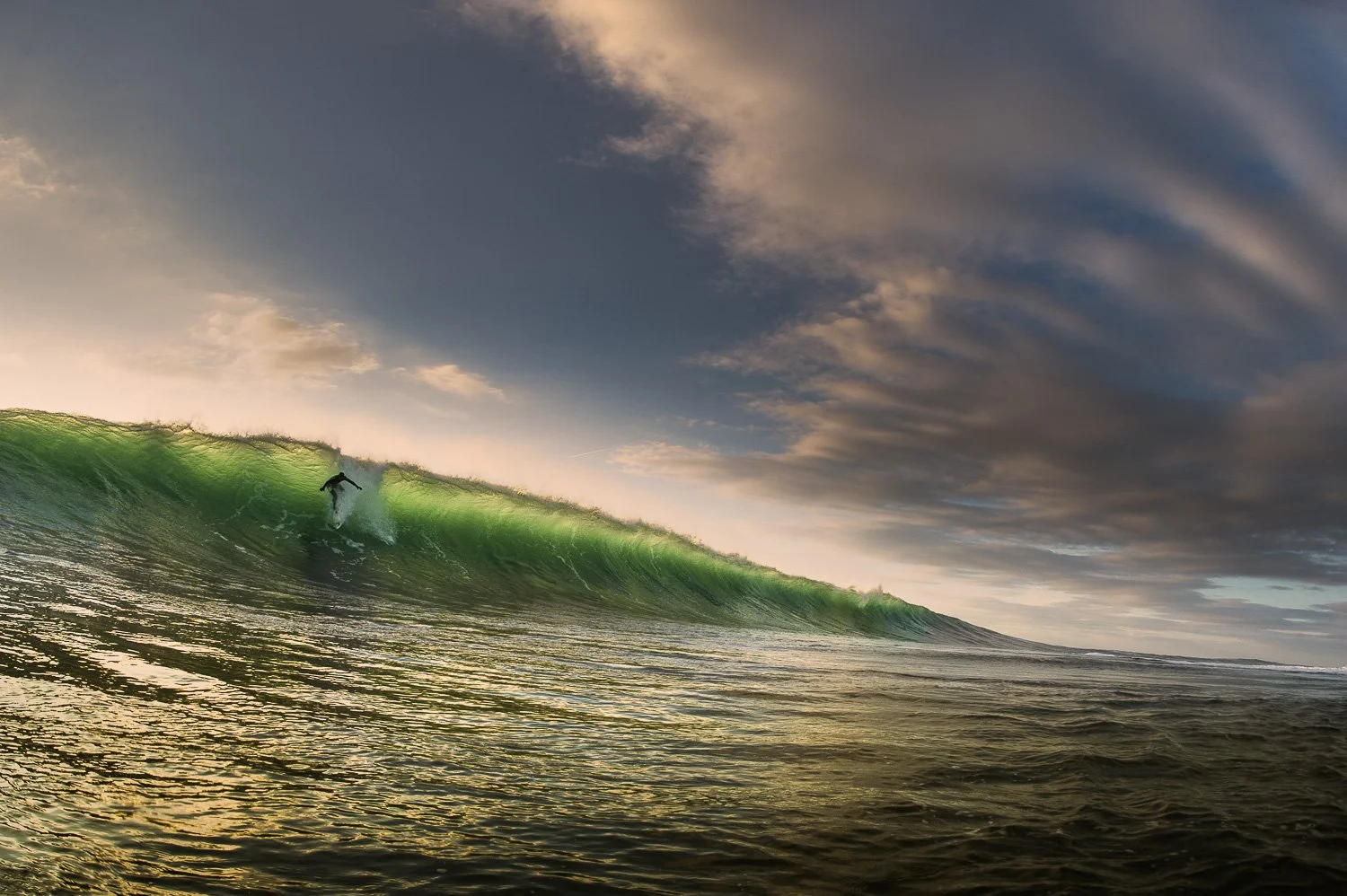 green-glass-wave-surfing-golden-hour.jpg