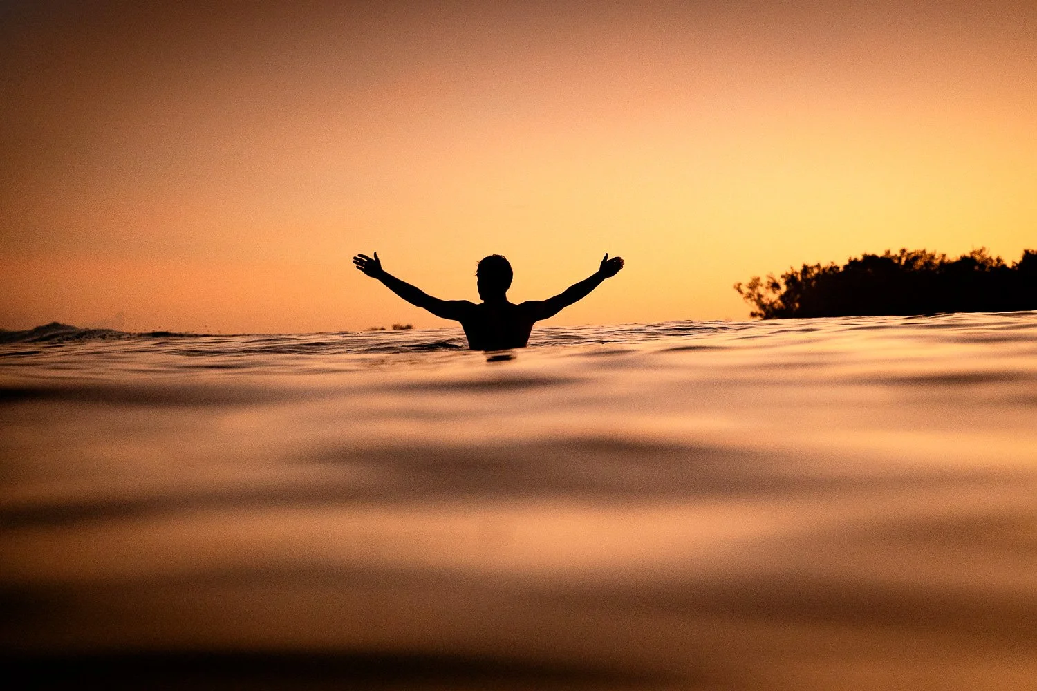 sunset-surfer-ocean-silhouette.jpg