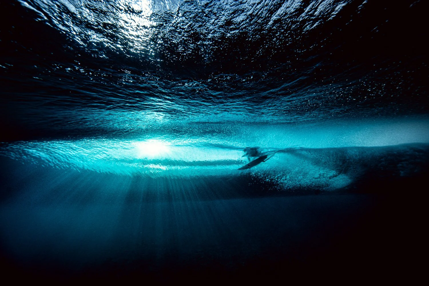 surfer-driving-through-clean-barrel-big-wave-underwater-the-hole-mentawai-indonesia.jpg