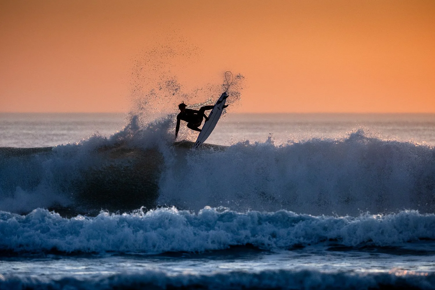 sunset-surf-action-aerial-maneuver-joshua-karbus-hossegor.jpg