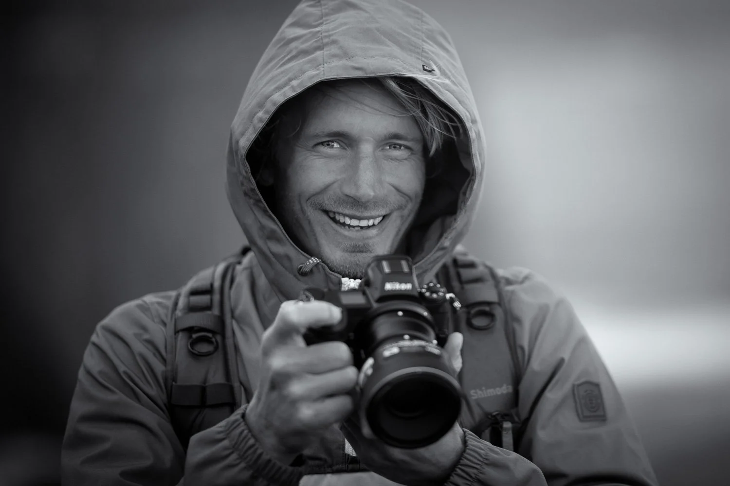 George Karbus with camera Nikon