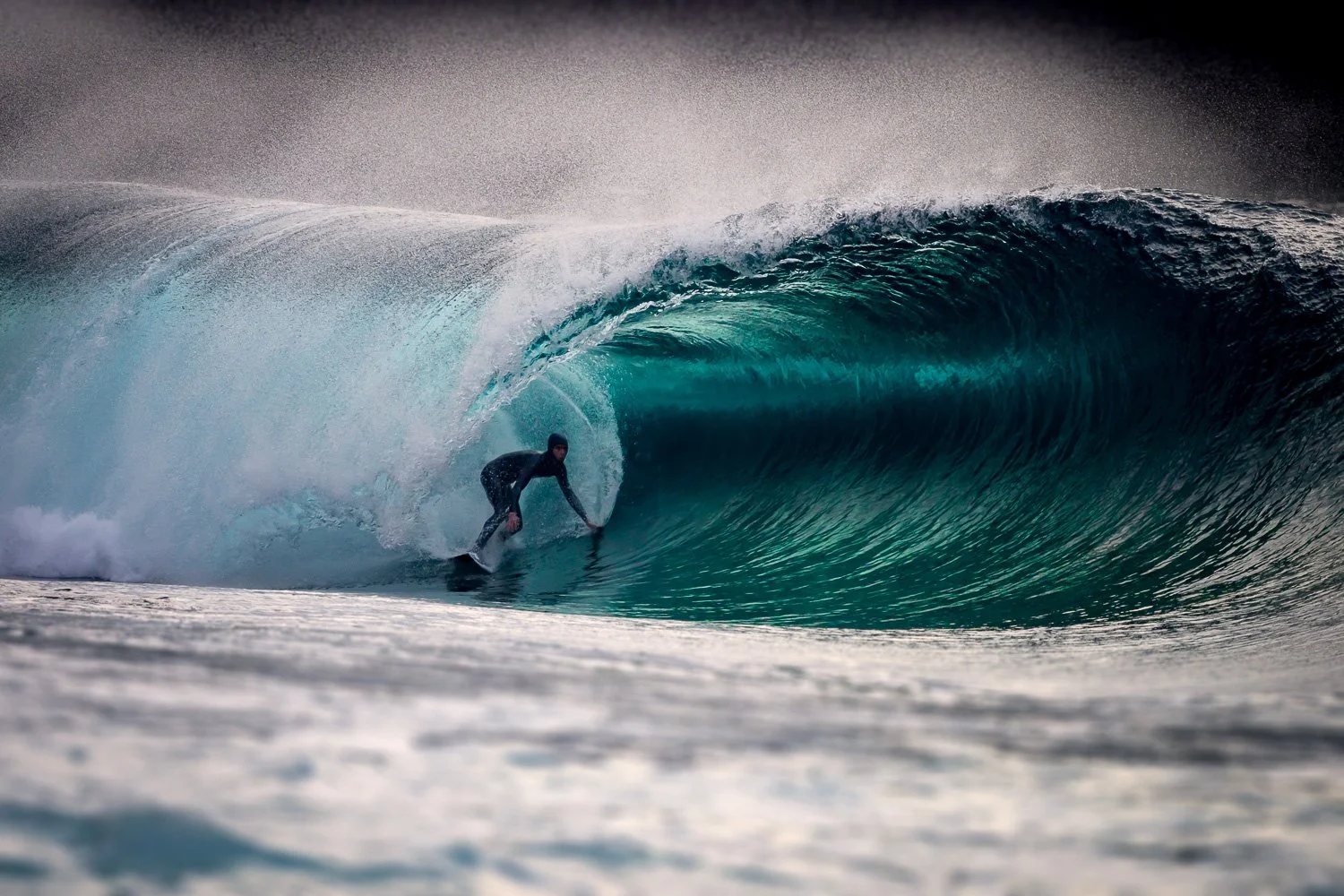 surfer-riding-heavy-turquoise-barrel-ocean-photography.jpg