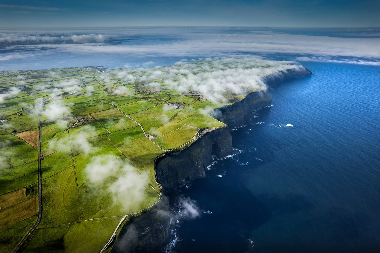 cliffs-of-moher-clouds-above-aerial.jpg