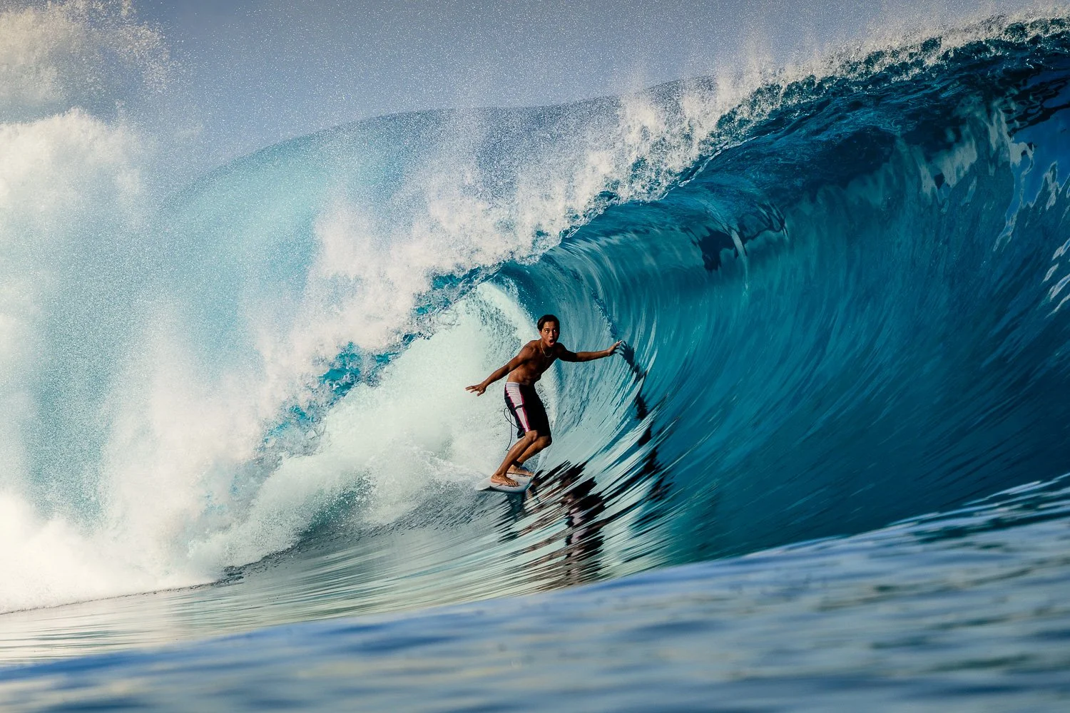 surfer-inside-blue-barrel-wave-mentawai.jpg
