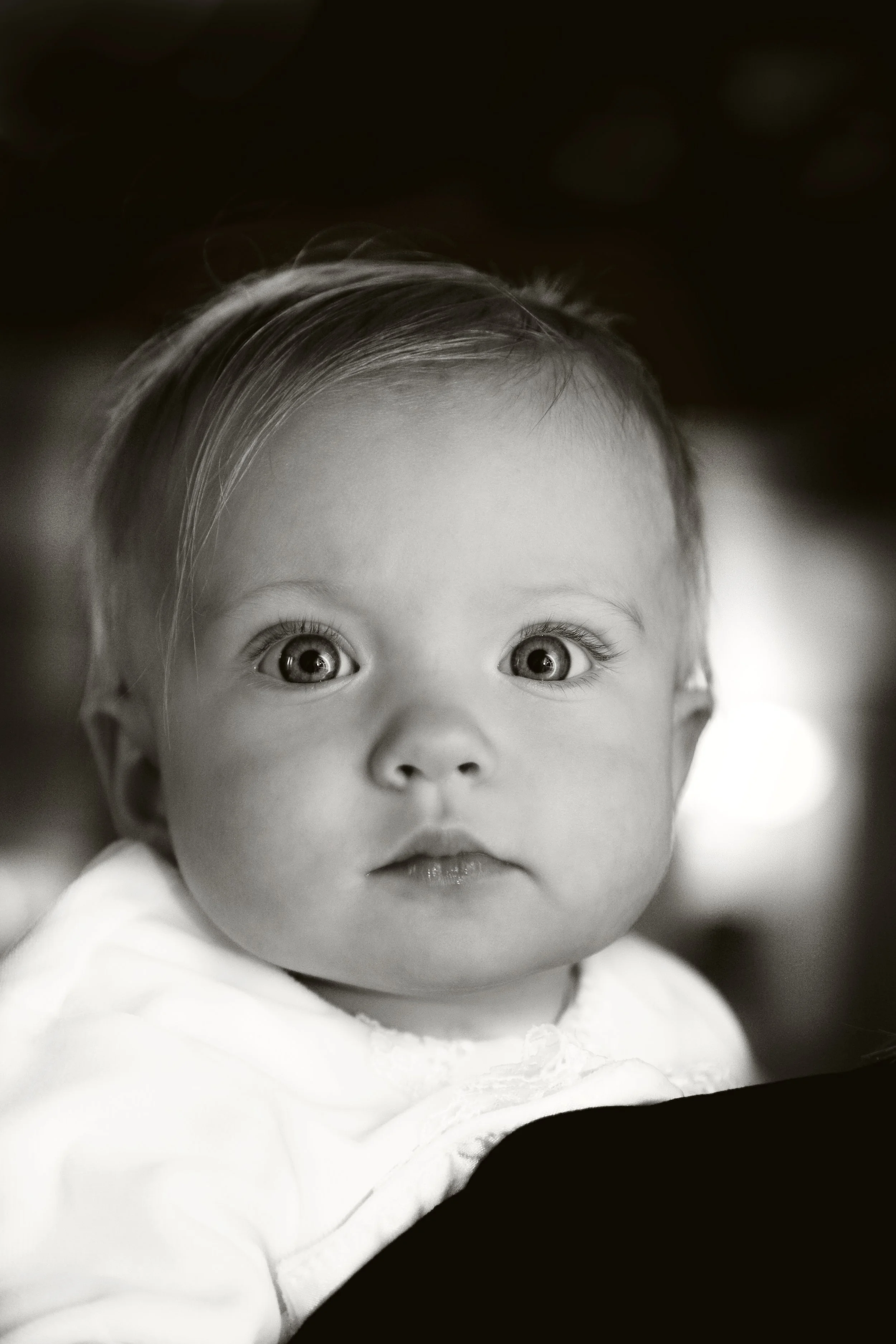Black and white image of a baby girl