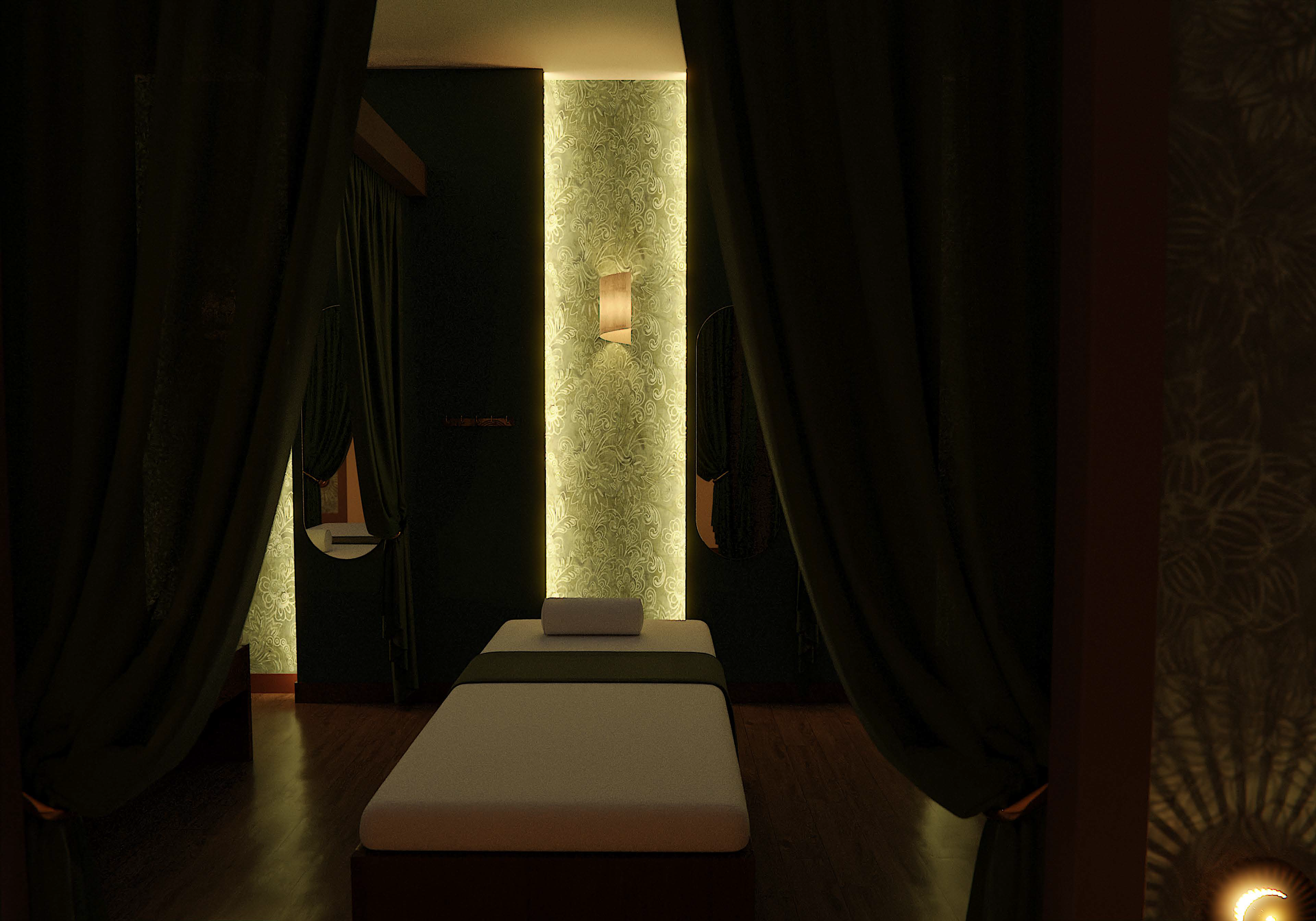 Dimly lit massage room with wooden floors, an illuminated wall, dark curtains, and a massage bed with a pillow.