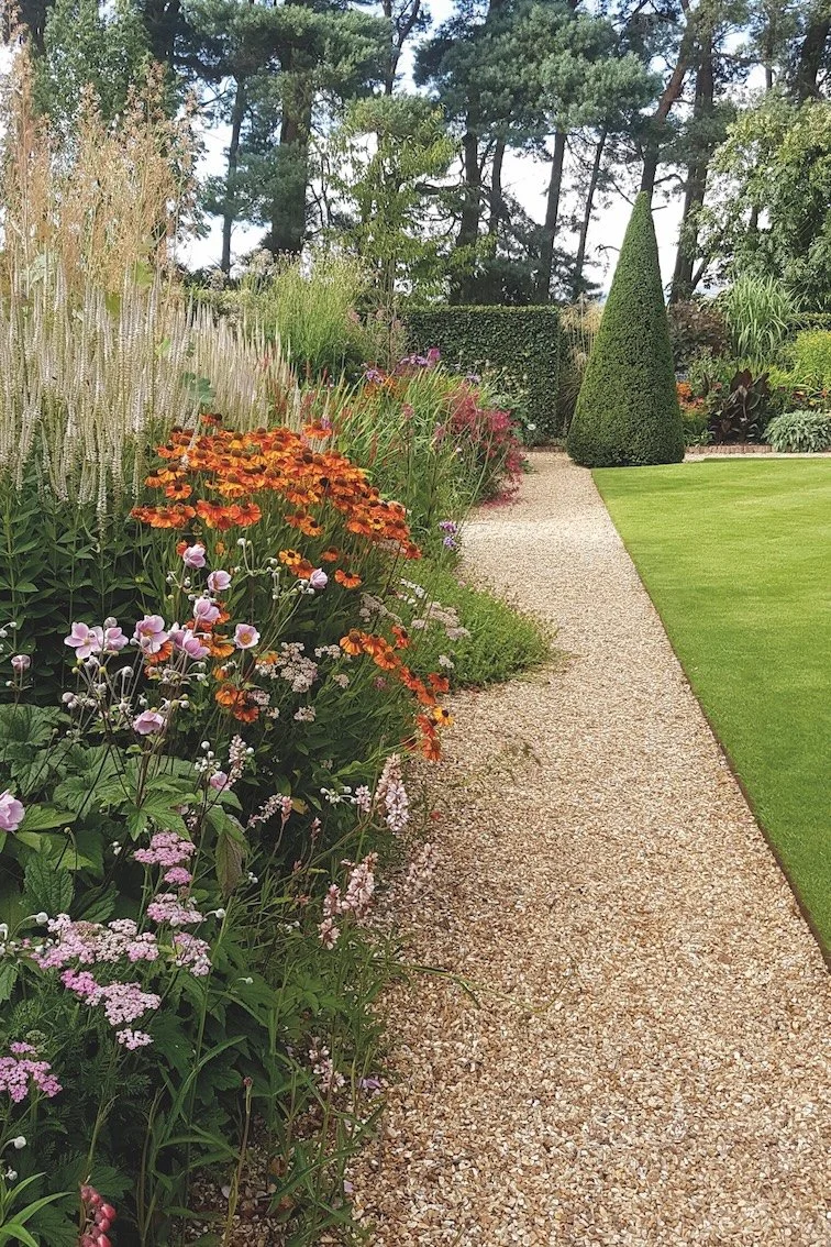 Beautifully planted borders of Lambshield.jpg