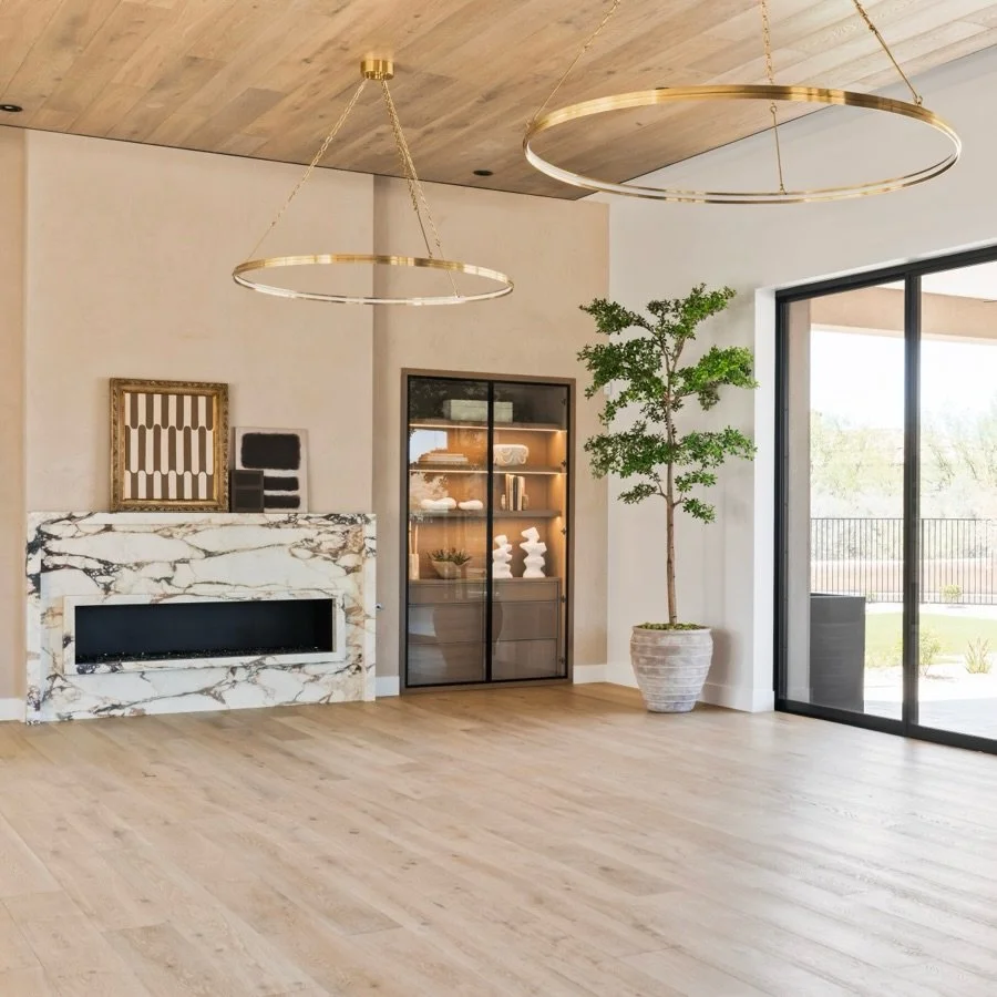 It&rsquo;s all in the details. Wrapped in white oak planks, the Great Room takes on a warm, tonal quality that draws the eye upward while grounding the entire space. The natural variation in the wood adds texture, creating depth without disrupting th