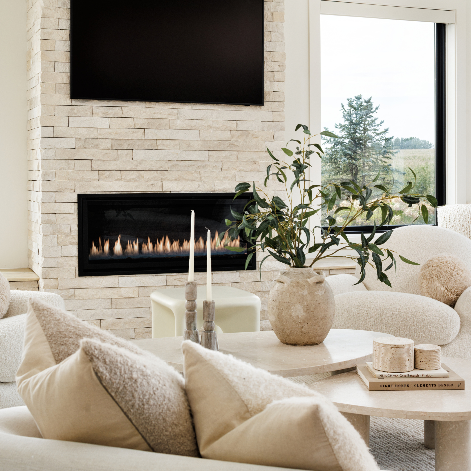 Oak and Ivory Great Room Detail Shot, marble coffee table and neutral accessories.