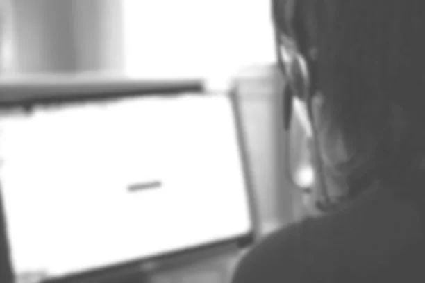 Person working on a computer aided dispatch system, dispatching ambulance, event medical, police and fire services. 