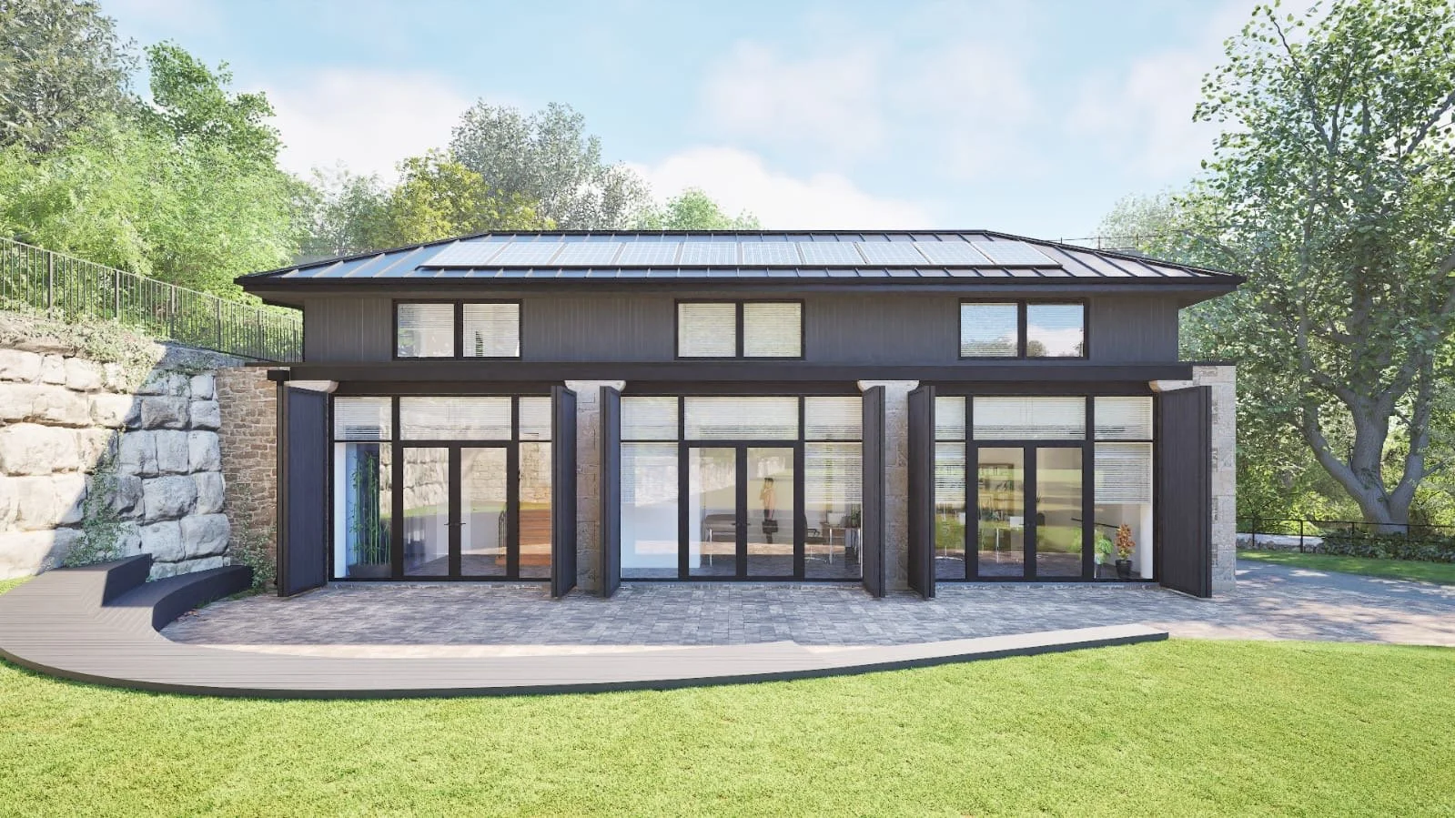 front elevation view of colinton community hub with large glazed openings and trees behind