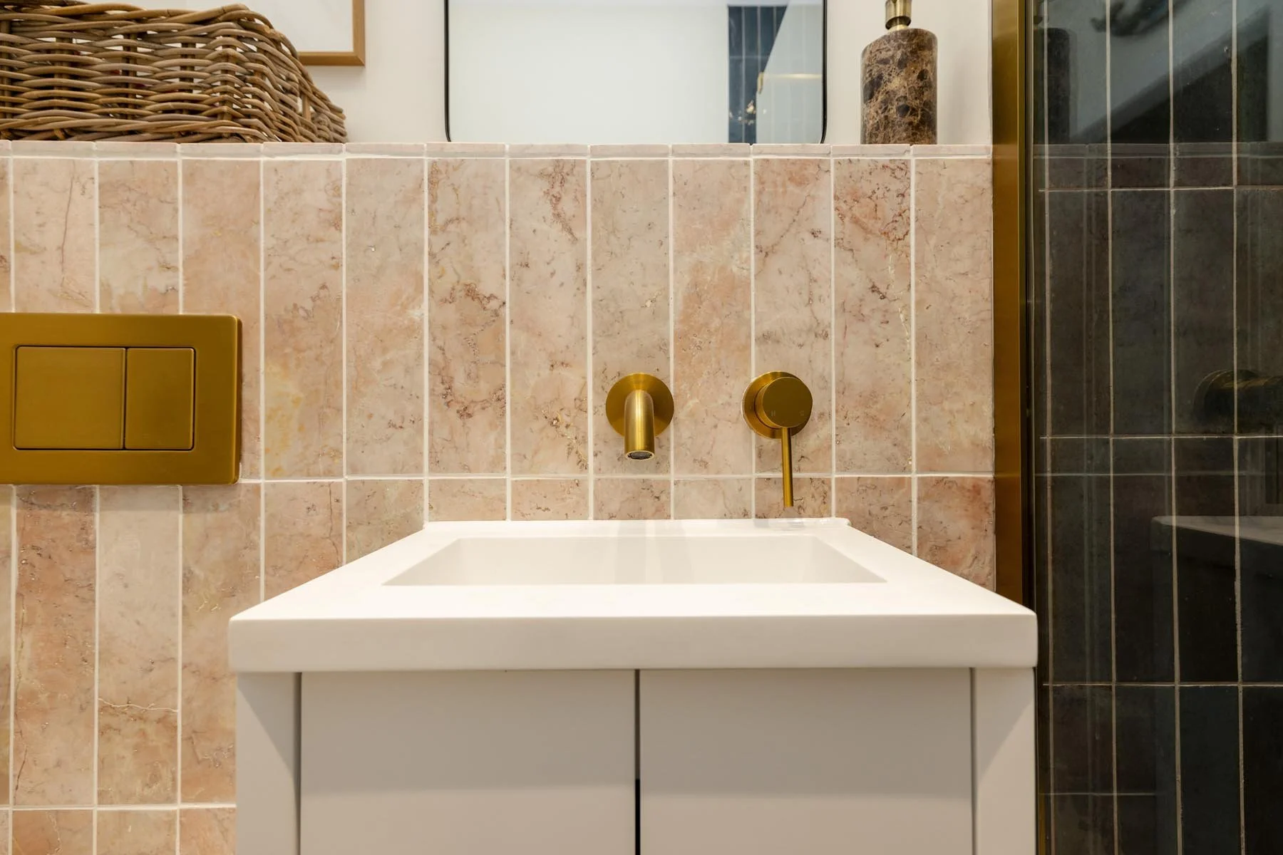 close up  view of wash hand basin and brass taps 