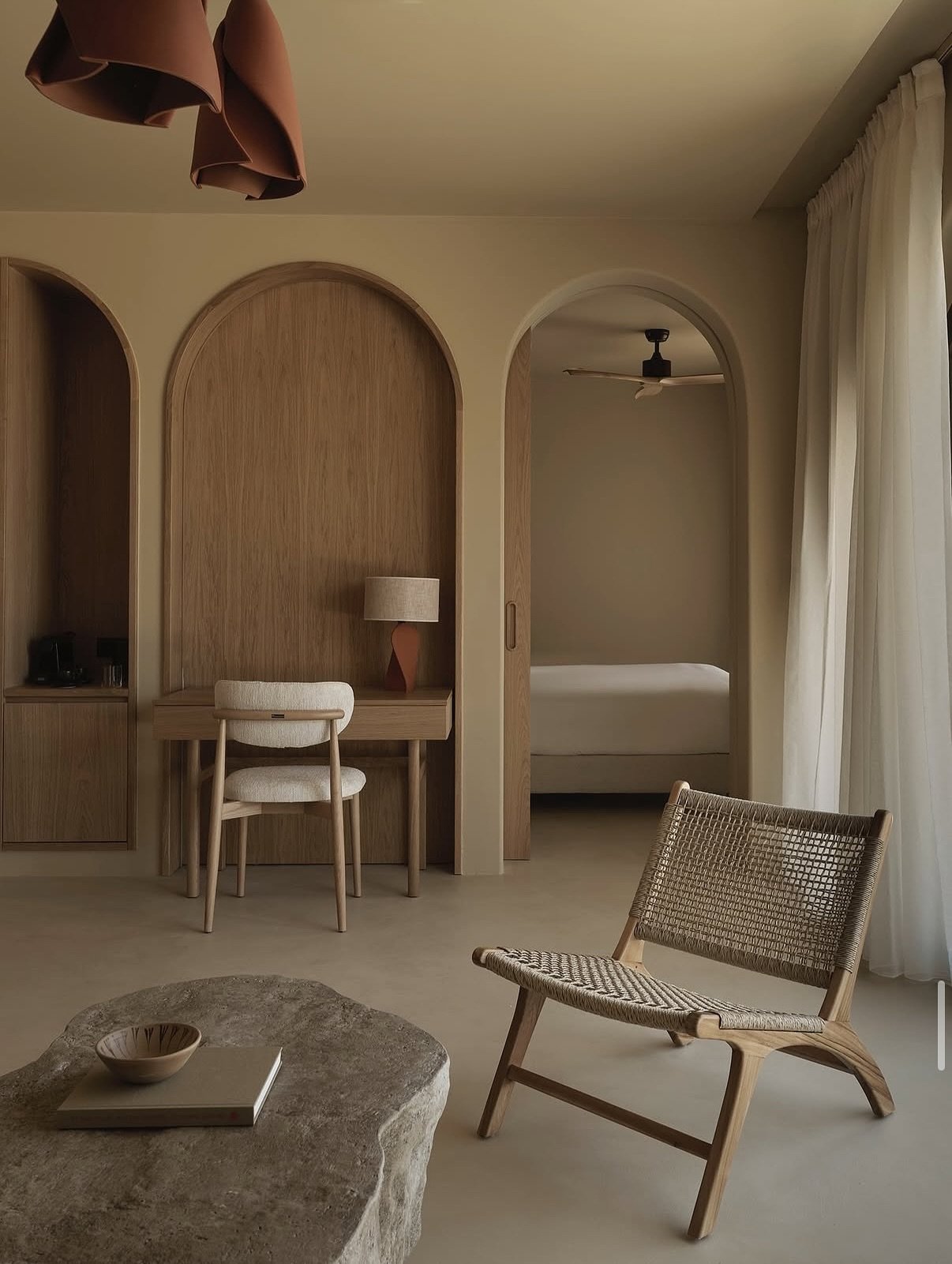 The design at @limhotels is defined by earthy materials, clean lines, and sculptural geometry. Neutral palettes, textured stone, and natural wood create a grounded, cohesive look throughout the interiors and architecture. Arched openings, built-in fo