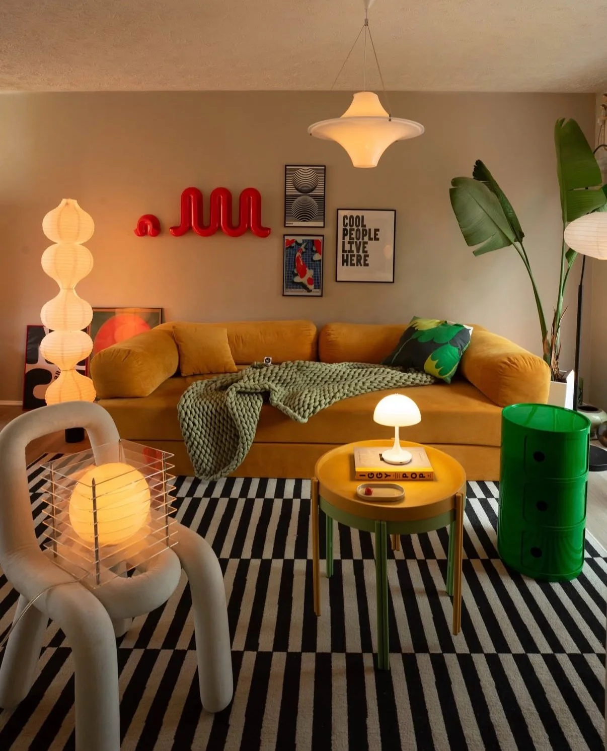 A groovy nod to the past reimagined for today.✨

This interior by @haikettua_atl channels the spirit of 1970s design with its bold colors, sculptural lamps, and playful geometry, yet it still feels unmistakably contemporary. The mustard velvet sofa, 