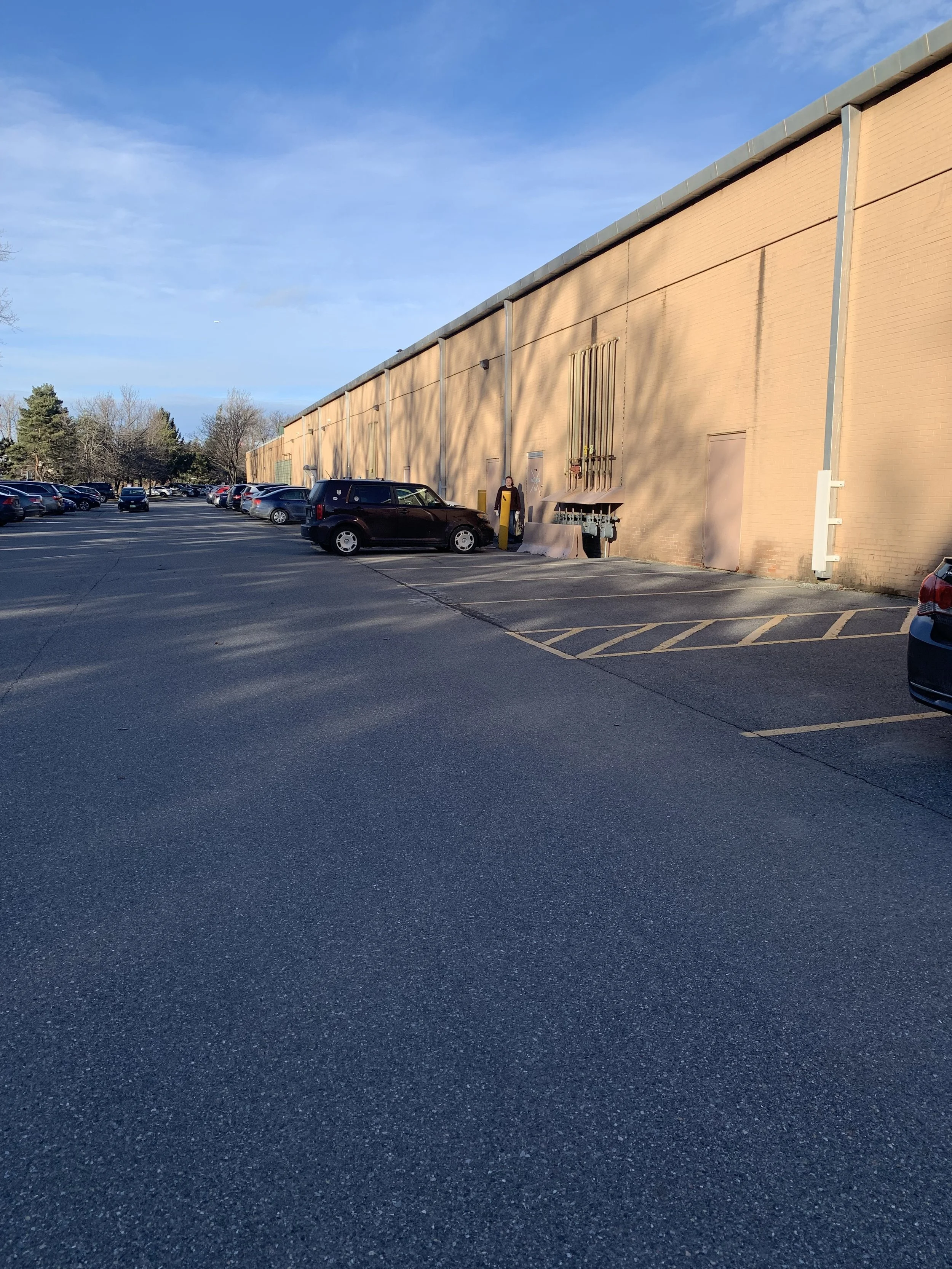 Drive behind Kohl’s. Our door is almost to "eatery" entrance