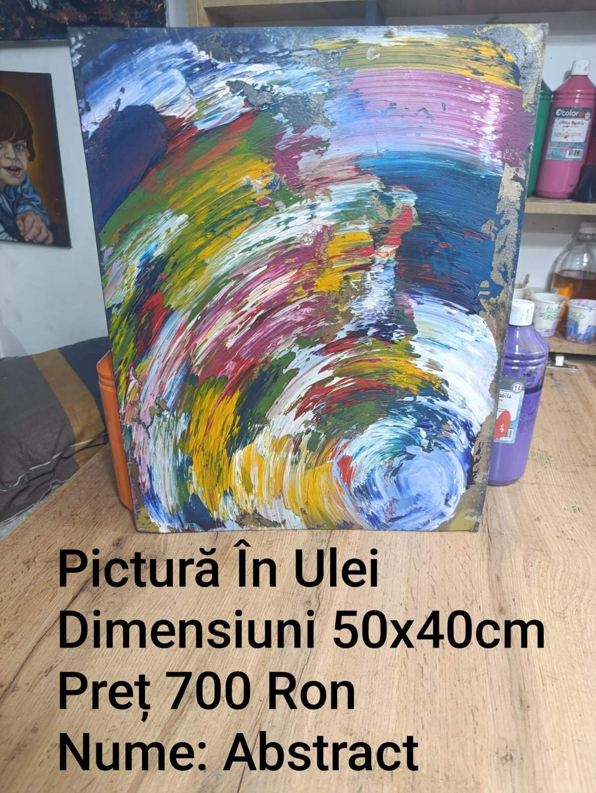 Oil painting with abstract colorful swirl pattern on display with text in Romanian indicating price and dimensions.