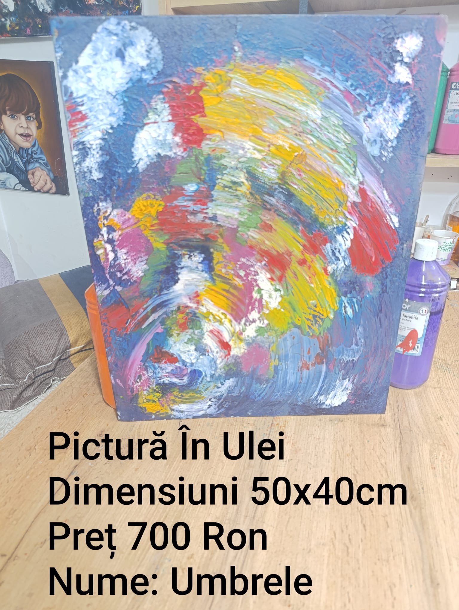 Oil painting with abstract colorful brush strokes, dimensions 50x40cm, priced at 700 Ron, titled 'Umbrele'. Text in Romanian.