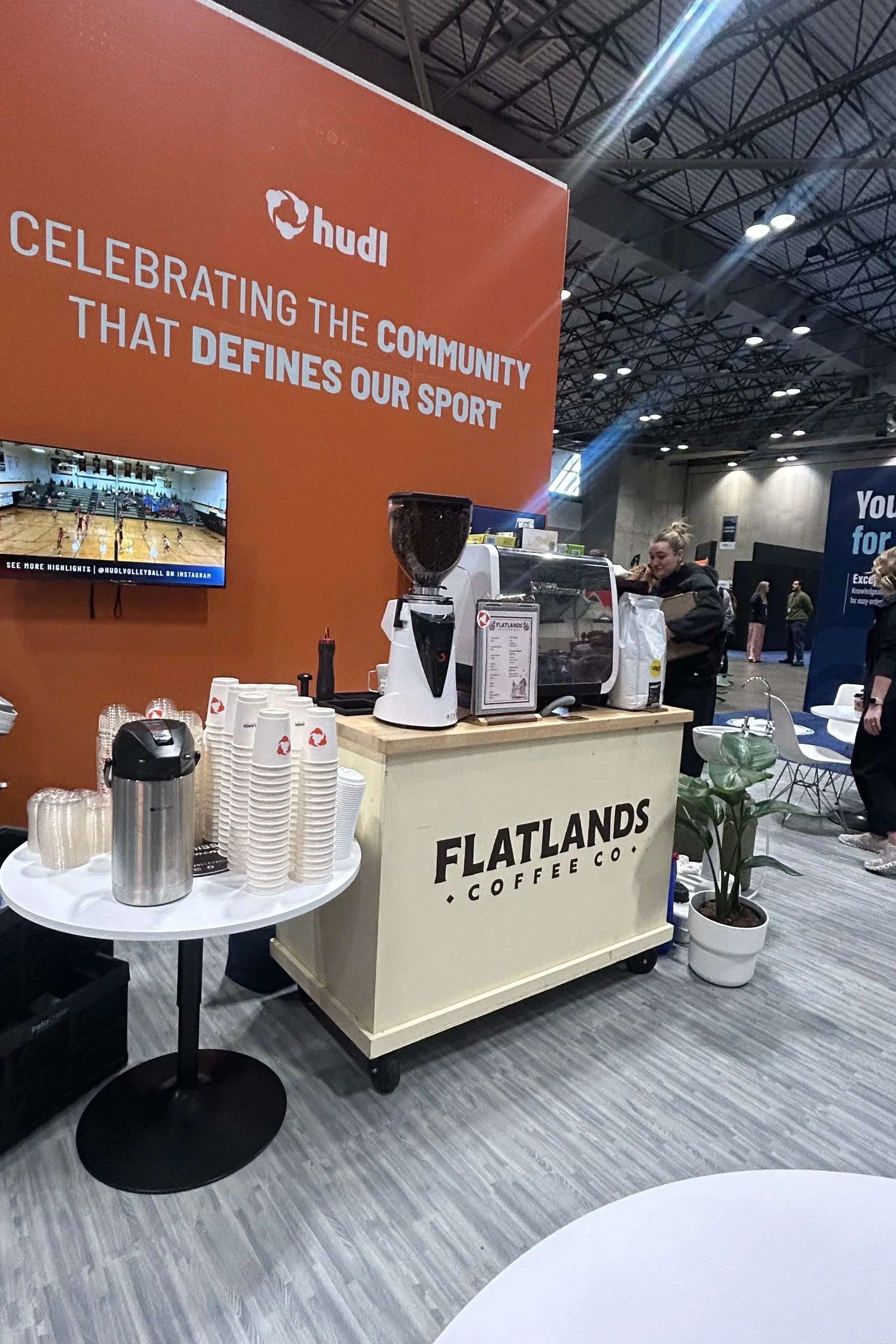 Mobile coffee cart at a convention ready to serve thousands of people with a custom logo print