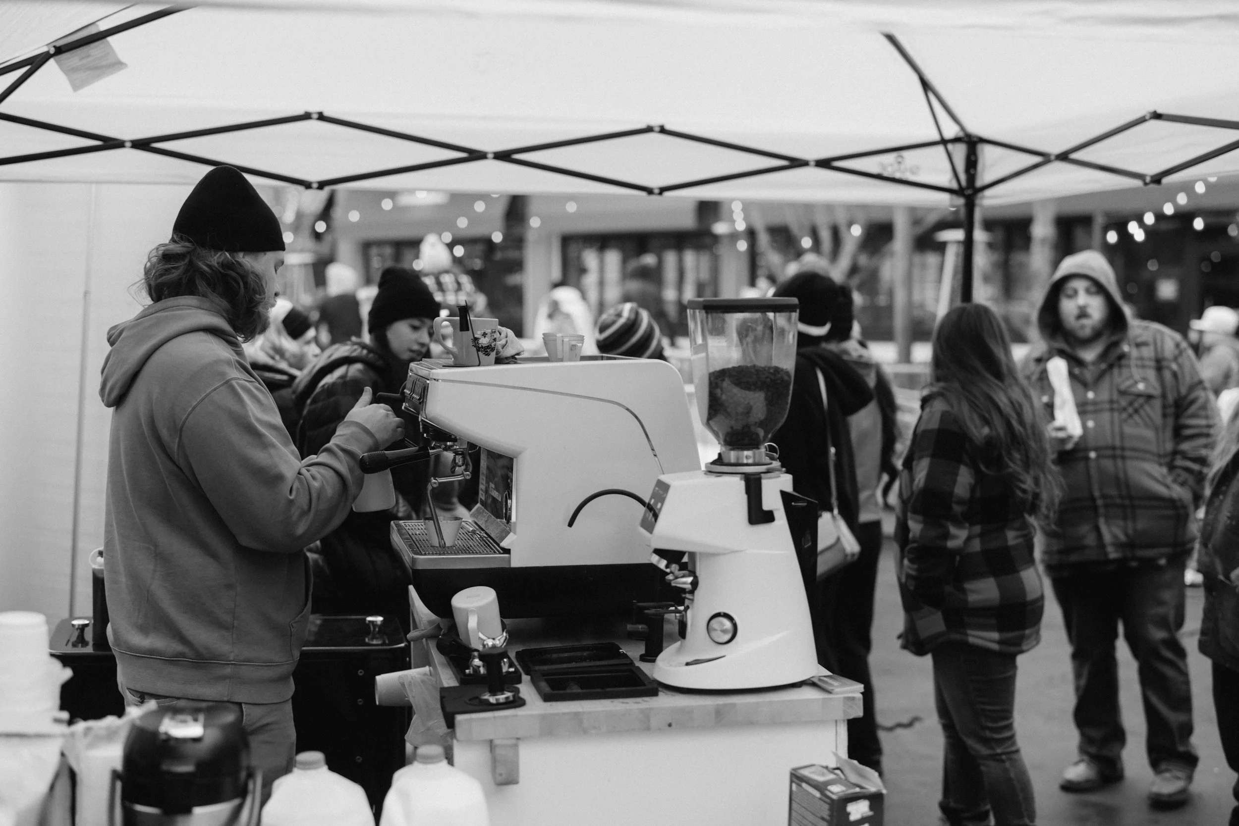 Barista making a coffee drink at a private event in Leawood Kansas