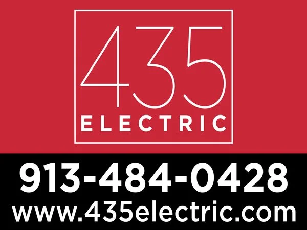 435 Electric business sign with company branding and contact details.