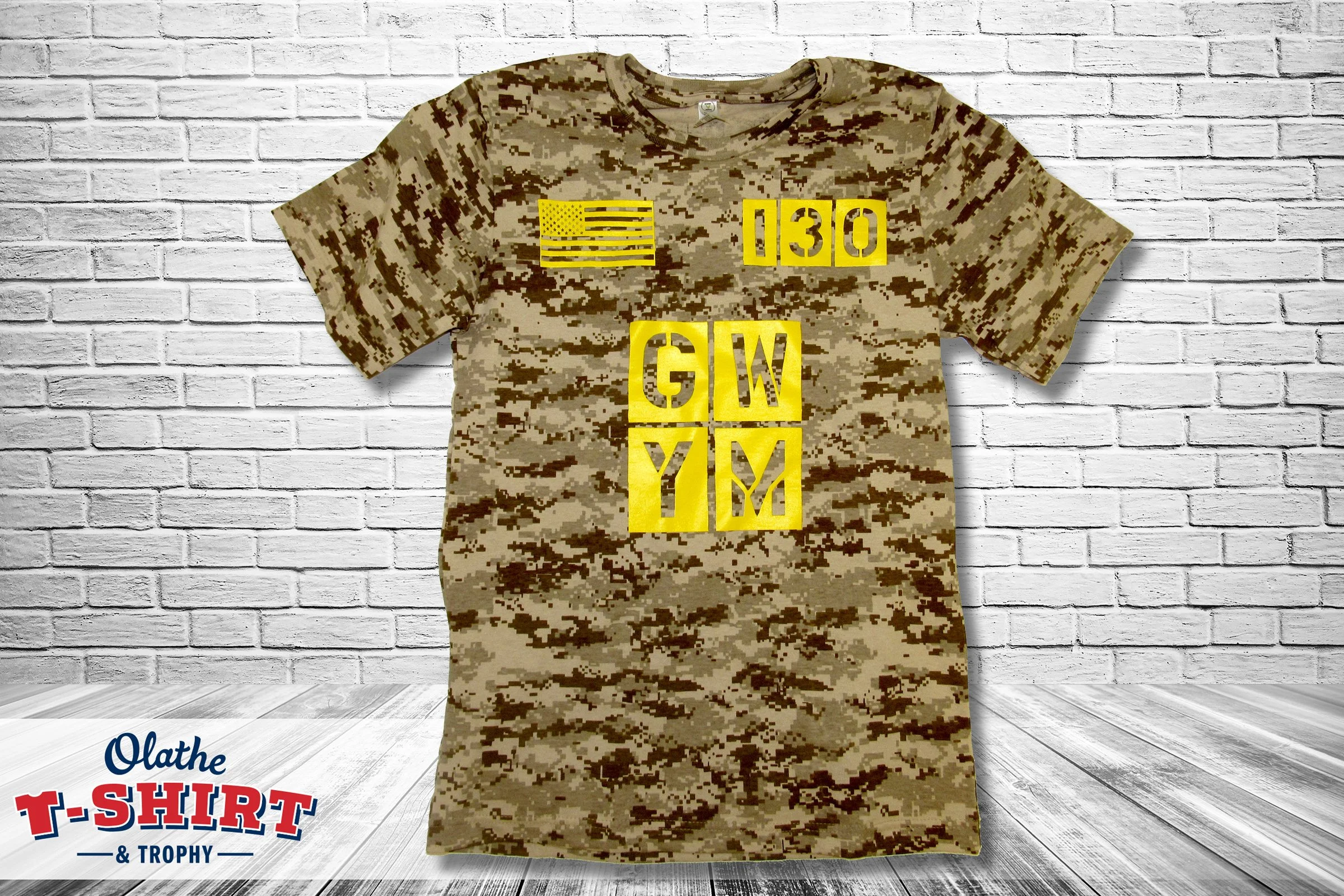 Gray and red Jaguars track-and-field shirt with a mascot and track graphic.