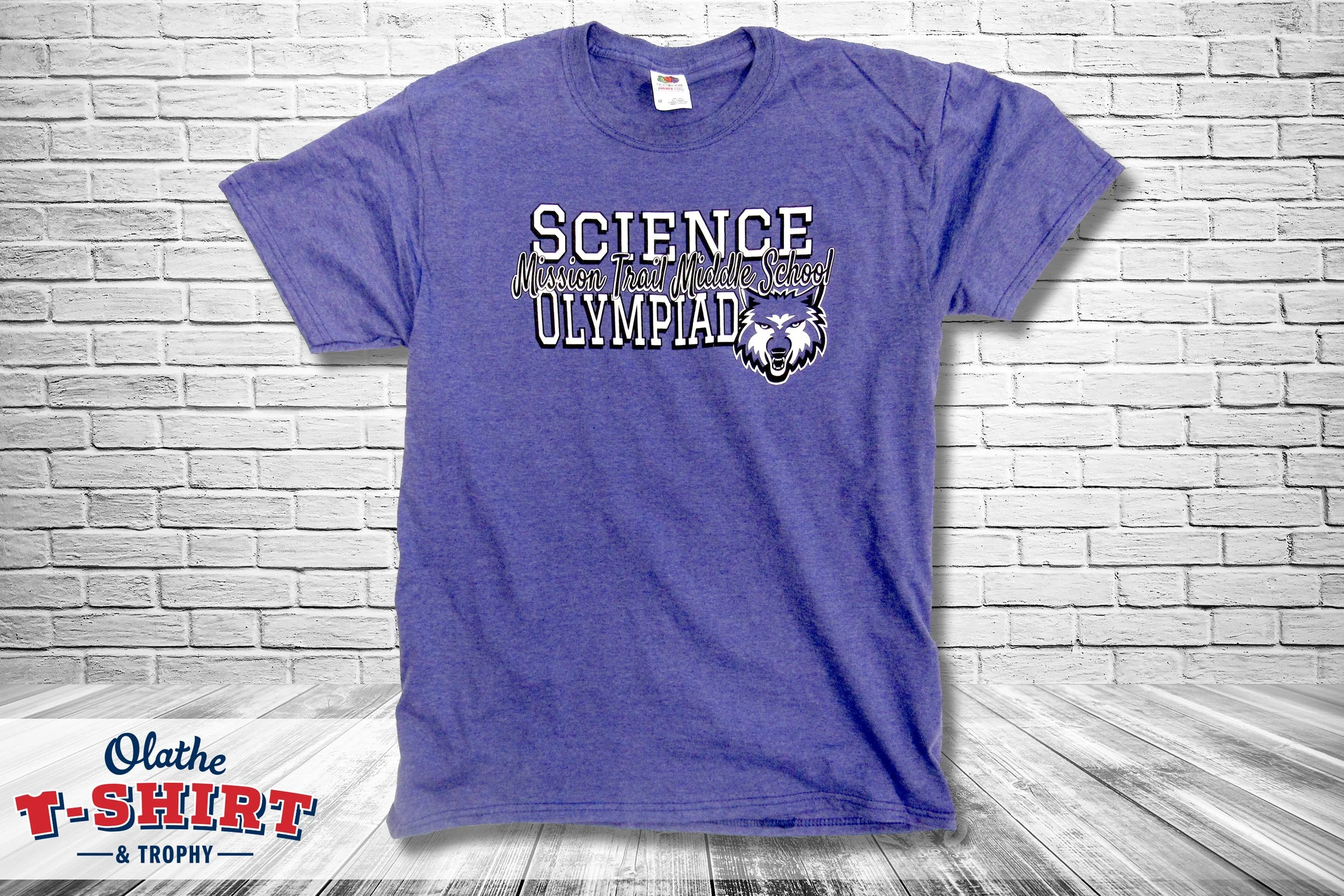 Purple Science Olympiad shirt with a school mascot and lettering.