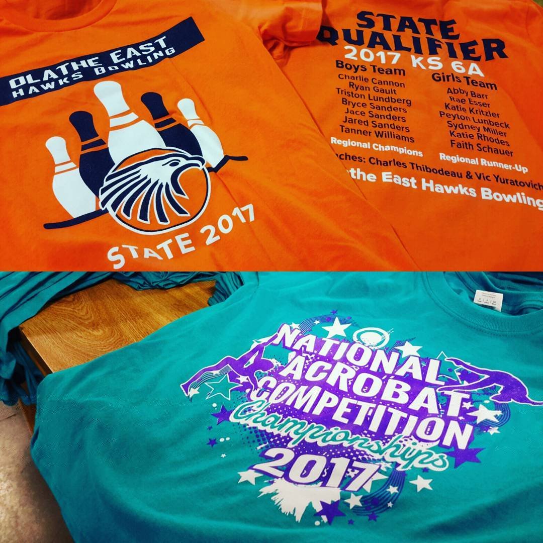 Orange and turquoise event shirts with bold sports graphics and lettering.