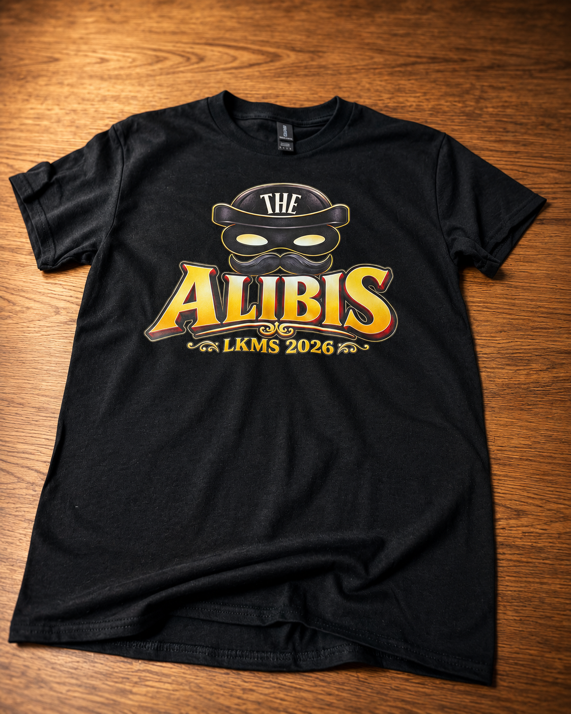 Mystery Emblem Black T-Shirt Flat Lay.png