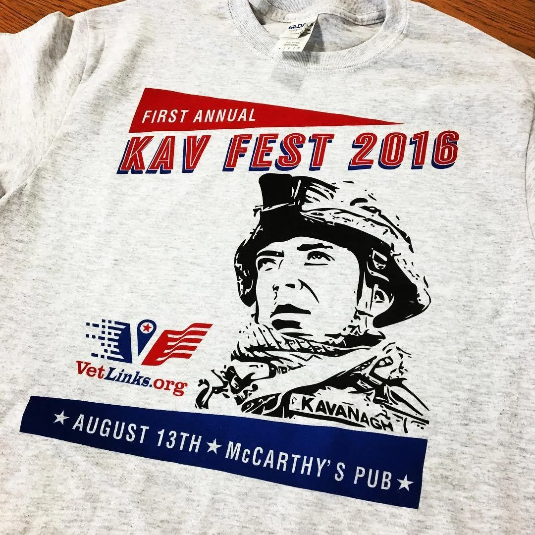 Gray event T-shirt with a detailed black illustration and event lettering.