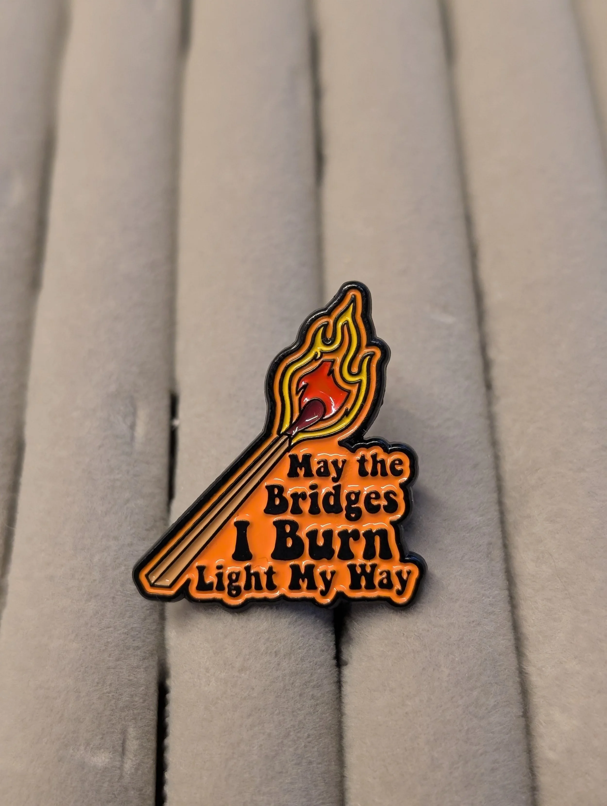 'May the Bridges I Burn Light My Way' Enamel Pin