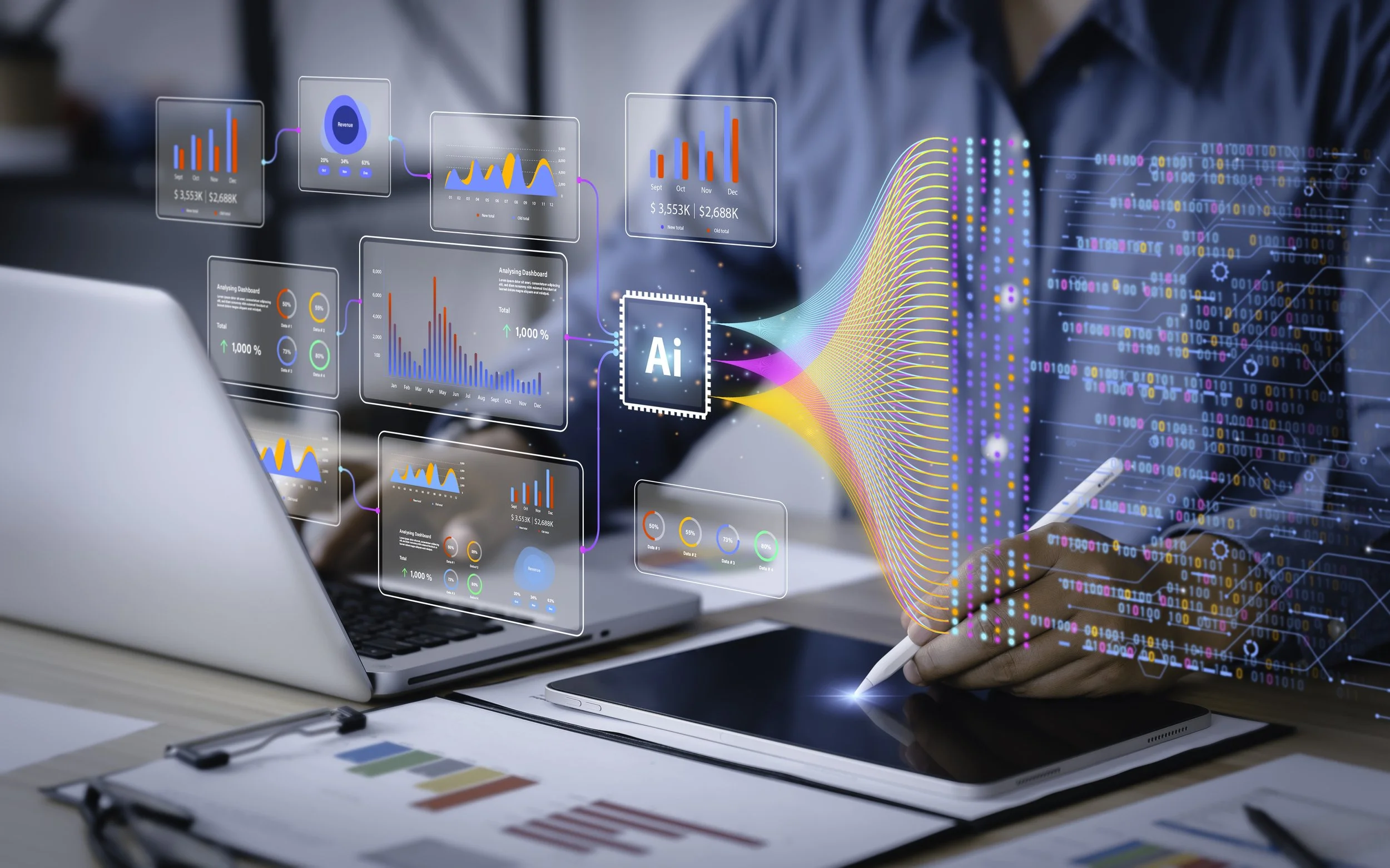close up of person multitasking on pad, laptop with graphic overlays of charts and data