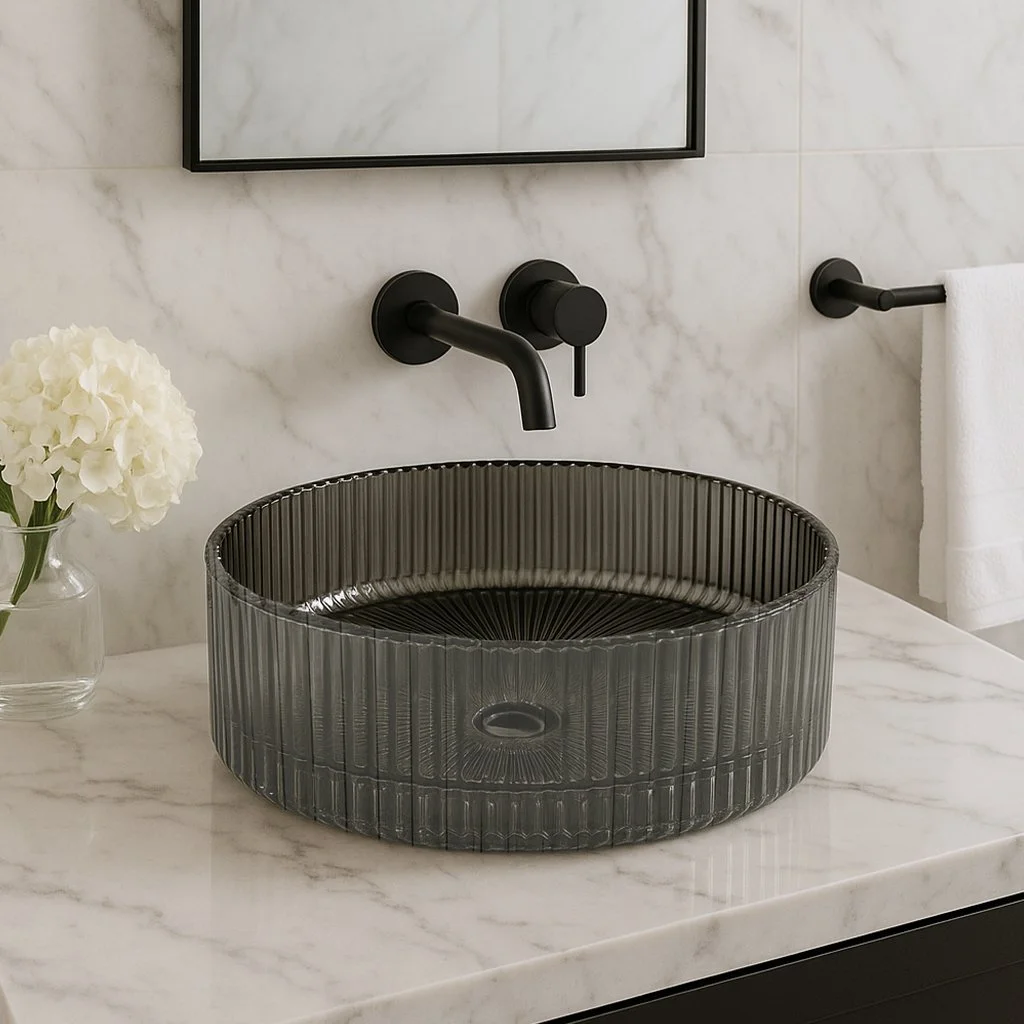 Modern, sculptural, and effortlessly upscale, this ribbed smoked-glass vessel sink brings hotel-level luxury to any bathroom.

#LuxuryBathroom #ModernBathDesign #GlassVesselSink #BathroomInspiration