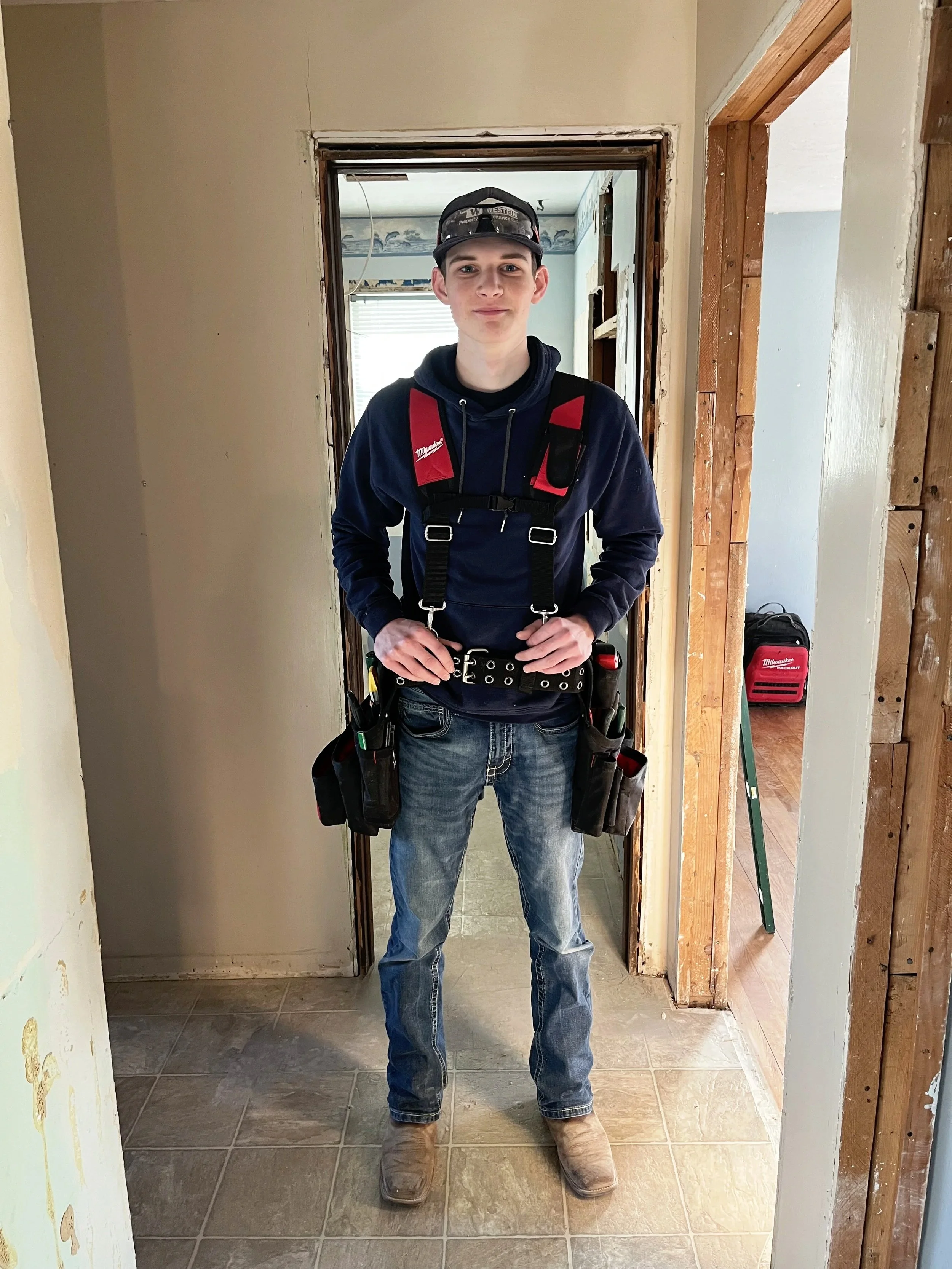 Westein Standing in a Fixer-Upper