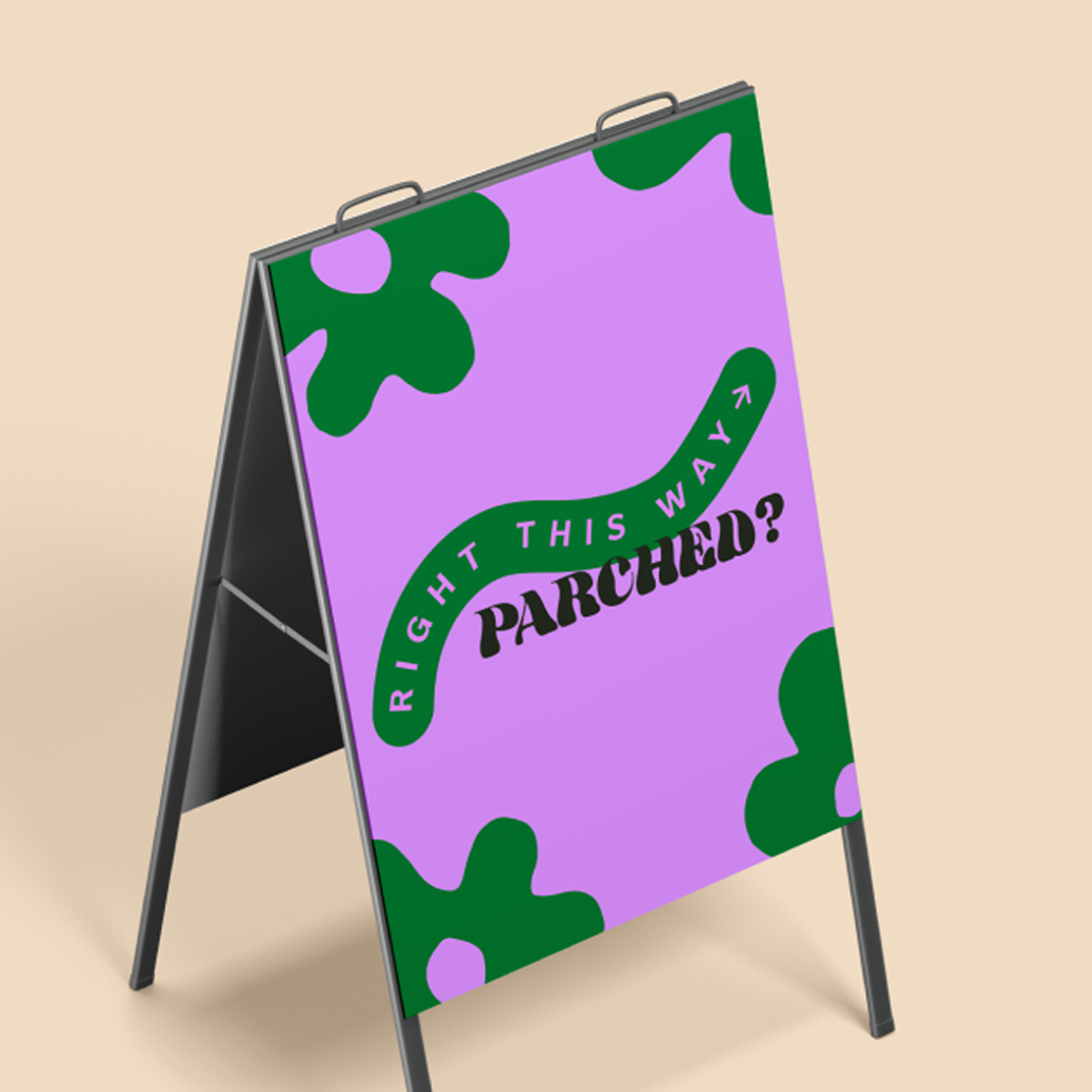 Purple sidewalk sign with green shamrock designs and the text 'Right this way' curved over 'Parched?' in black.