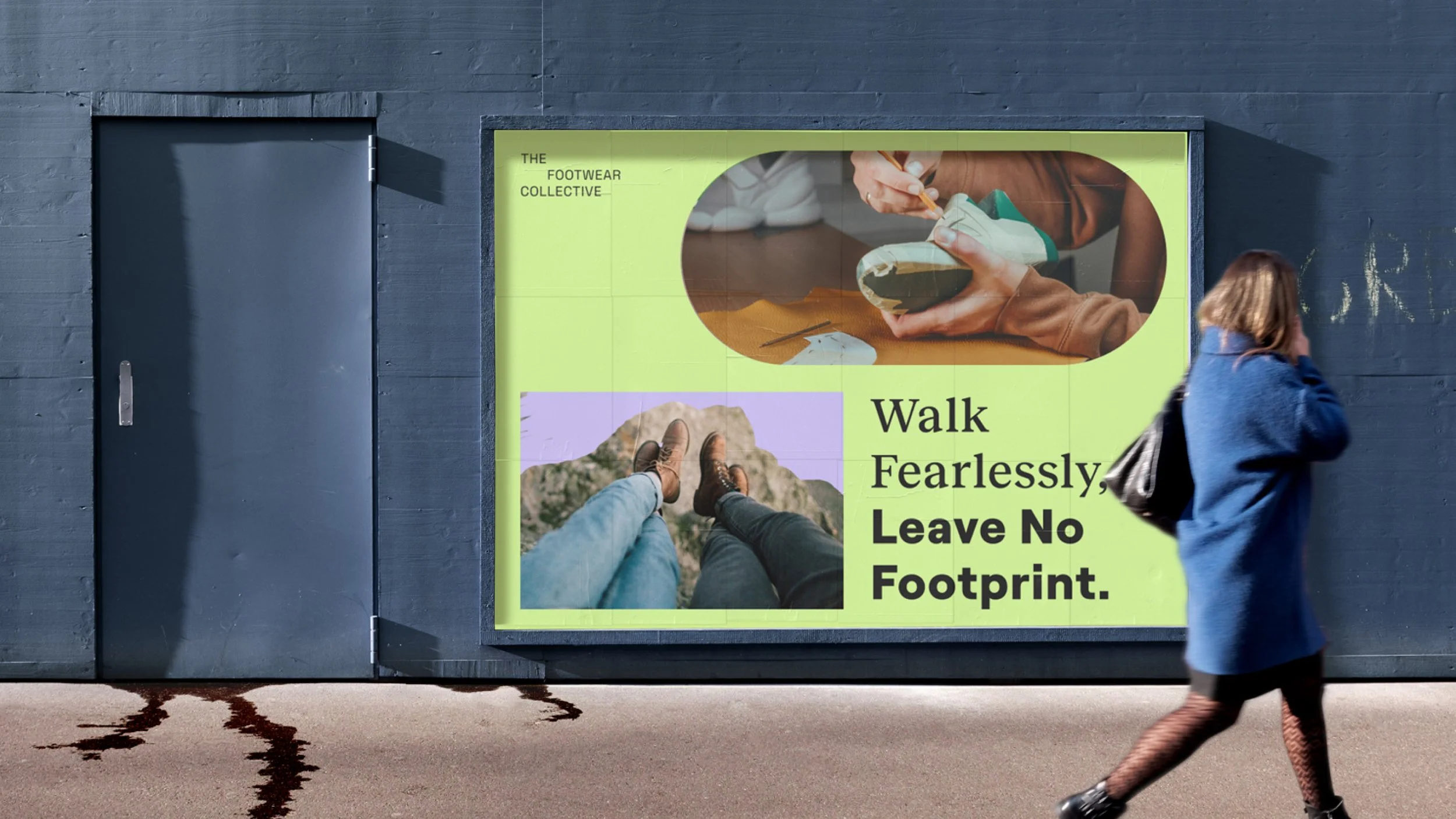 A woman walking past an advertisement on a black wall. The advertisement promotes walking fearlessly and leaving no footprint, featuring images of shoes and people walking on mountains.